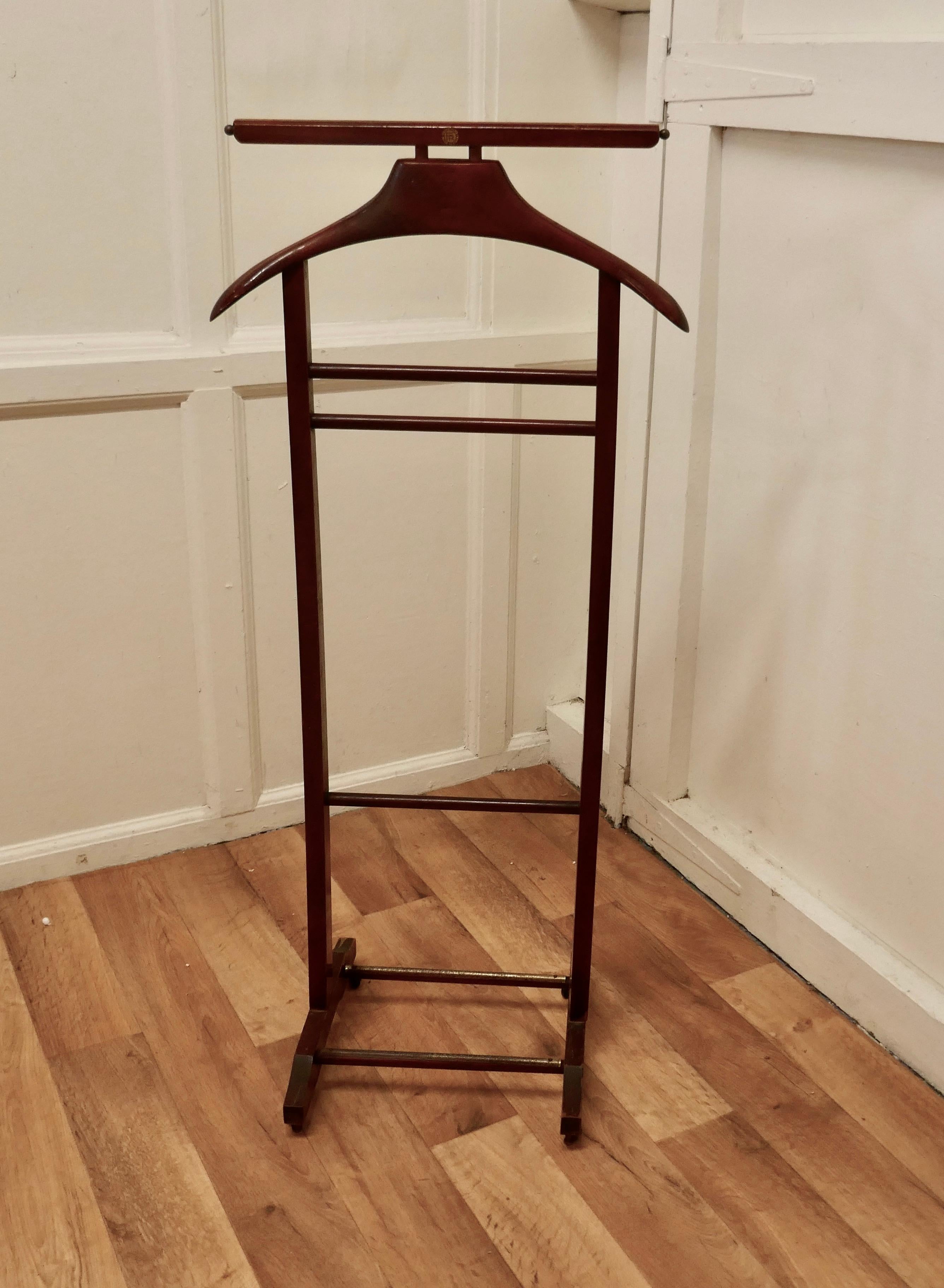 Italian Art Deco gentleman’s floor standing suit hanger by Brevettato

 A very useful piece, the hanger or clothes stand is made in Beech, it will accommodate jacket and trousers, but it would do just as well for your jeans and a jacket overnight