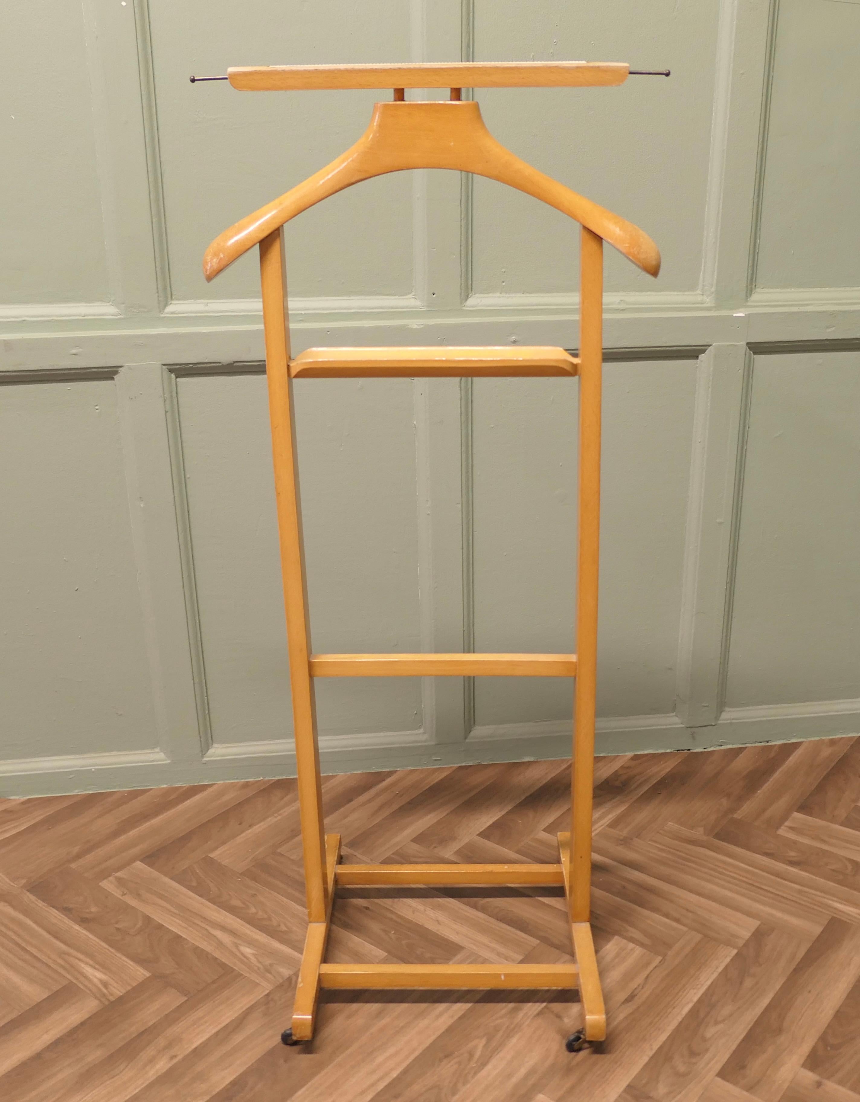 Italian Art Deco Gentleman’s Floor Standing Valet or Suit Hanger 

 A very useful piece, the Valet or clothes stand is made in beech, it will accommodate jacket and trousers, but it would do just as well for your jeans and a jacket overnight or