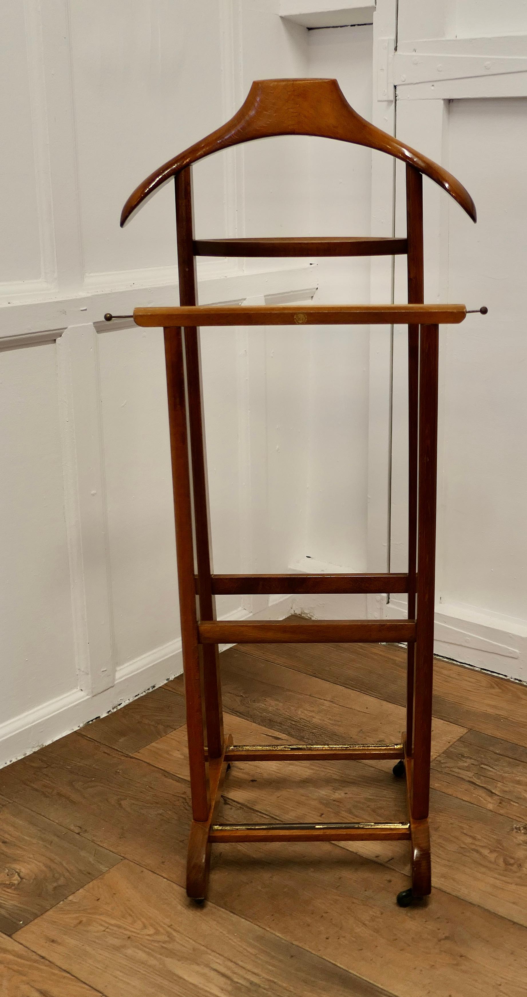 Italian Art Deco Gentleman’s Suit Hanger or Night Stand, the Versatile Valet,

A very useful piece, the hanger or clothes stand is made in beech, it has a hanger and will accommodate not only jacket it also has a separate rail for trousers, ties