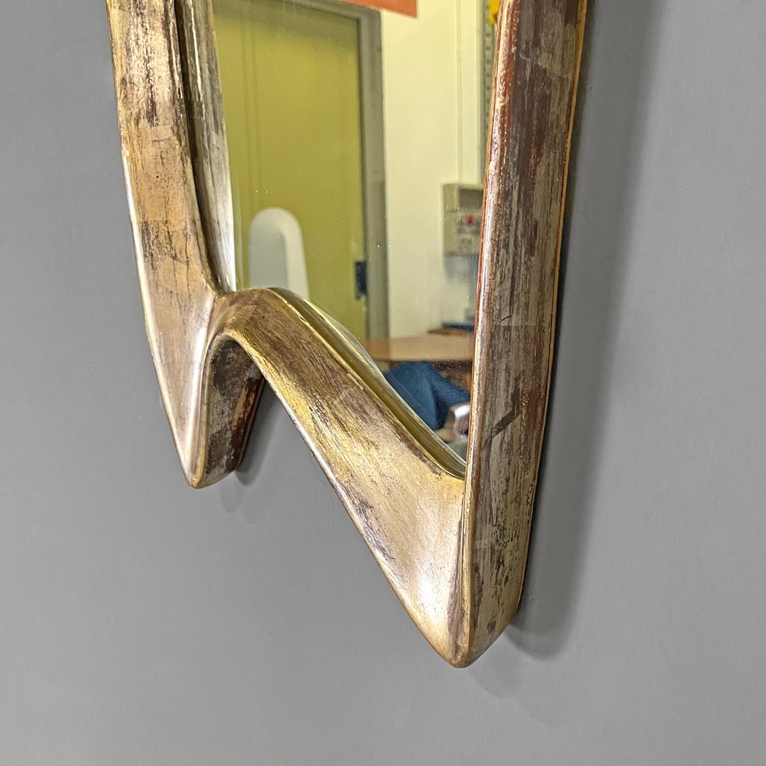 Italian Art Deco golden wood wall mirror with abstract curved structure, 1940s For Sale 6