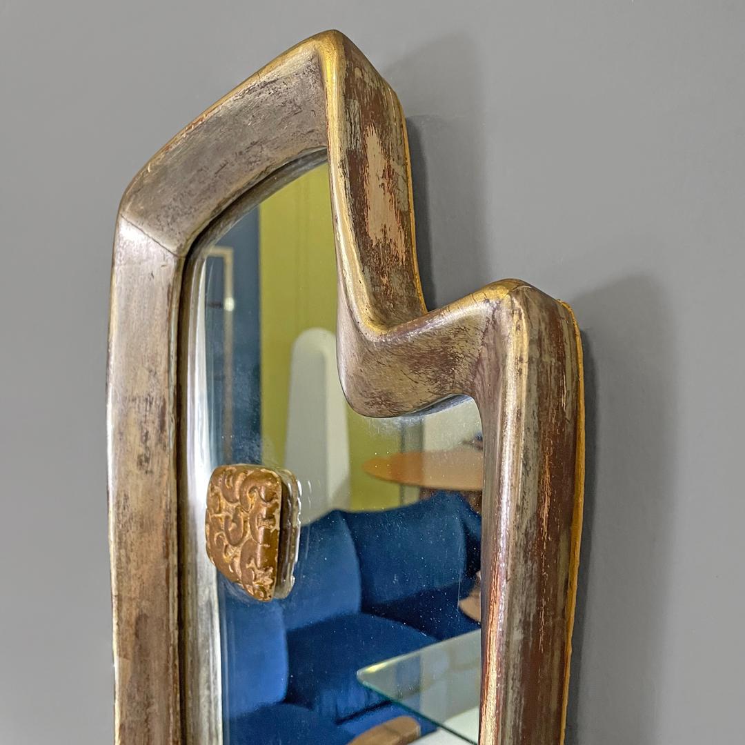 Italian Art Deco golden wood wall mirror with abstract curved structure, 1940s For Sale 1