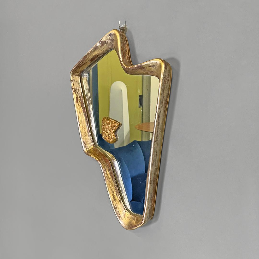 Mid-20th Century Italian Art Deco golden wood wall mirror with abstract curved structure, 1940s For Sale