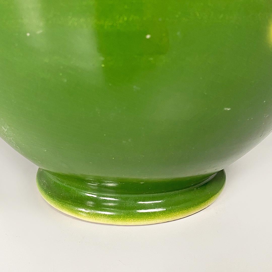 Mid-20th Century Italian Art Deco Green Ceramic Vase with a Circular Motif by Deruda, 1940 Ca. For Sale