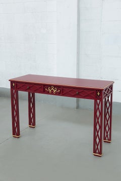 Italian Art Deco lacquered red console with gold inserts