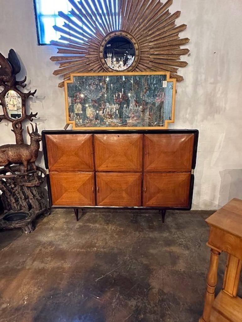 Rare Italian Art Deco design mahogany and ebonized bar cabinet. Circa 1940. Sure to make a statement!
