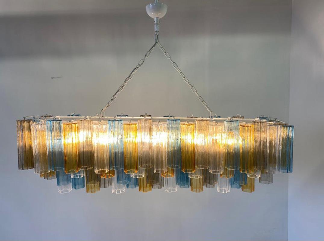 This Venini style chandelier was produced in Italy, more precisely in Murano, near Venice, which is the world's capital of the art of glass crafting. 
The chandelier is composed of about 100 Murano glass pieces made by master craftsmen.
Height