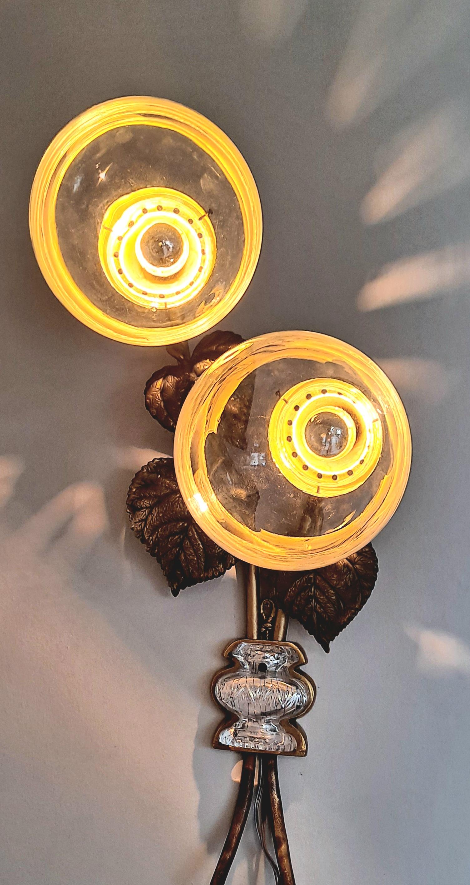 Italian Art Deco brass and  metal sconces decorated with brass leaves  and  glass globes. Wall sconce is stunning Italian antique design. This is a large wall sconce size . Shipping UPS or FedEx standard parcel with insurance 
5-7 days  $125 