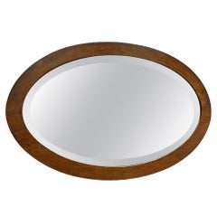 Italian Art Deco oval wall mirror in wood, 1940s