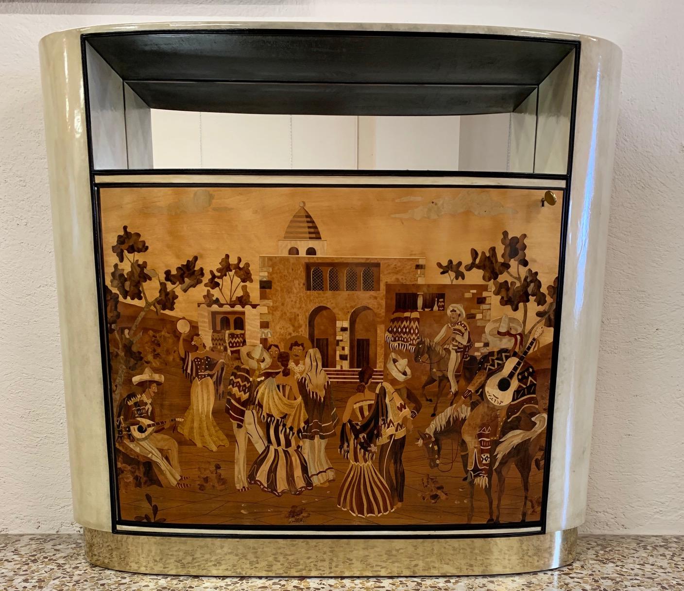 This item was produced in the 1940s in Italy by Vittorio Dassi for the ' Permanente Mobili Cantù' .
The cabinet is completely covered with parchment with black ebonized profiles.
The large central door has a beautiful inlay with innumerable