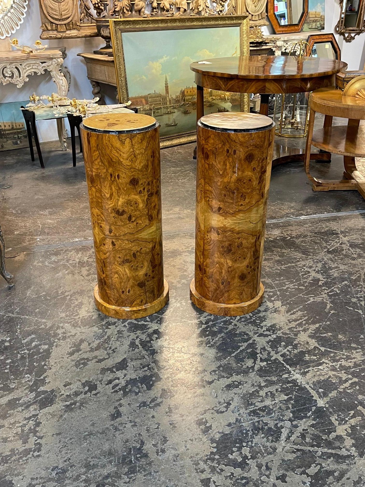 Italian Art Deco style burl walnut pedestals, Circa 1960. These pedestals have a beautiful wood grain and polish. A fine addition to any home. Note: These are sold each. 