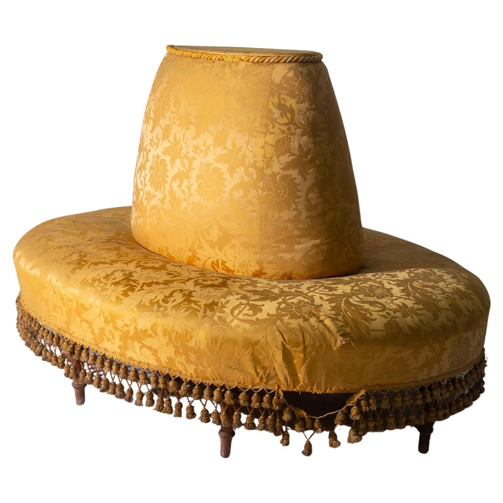 Italian Art Deco round boudoir sofa in original golden satin fabric with tassels