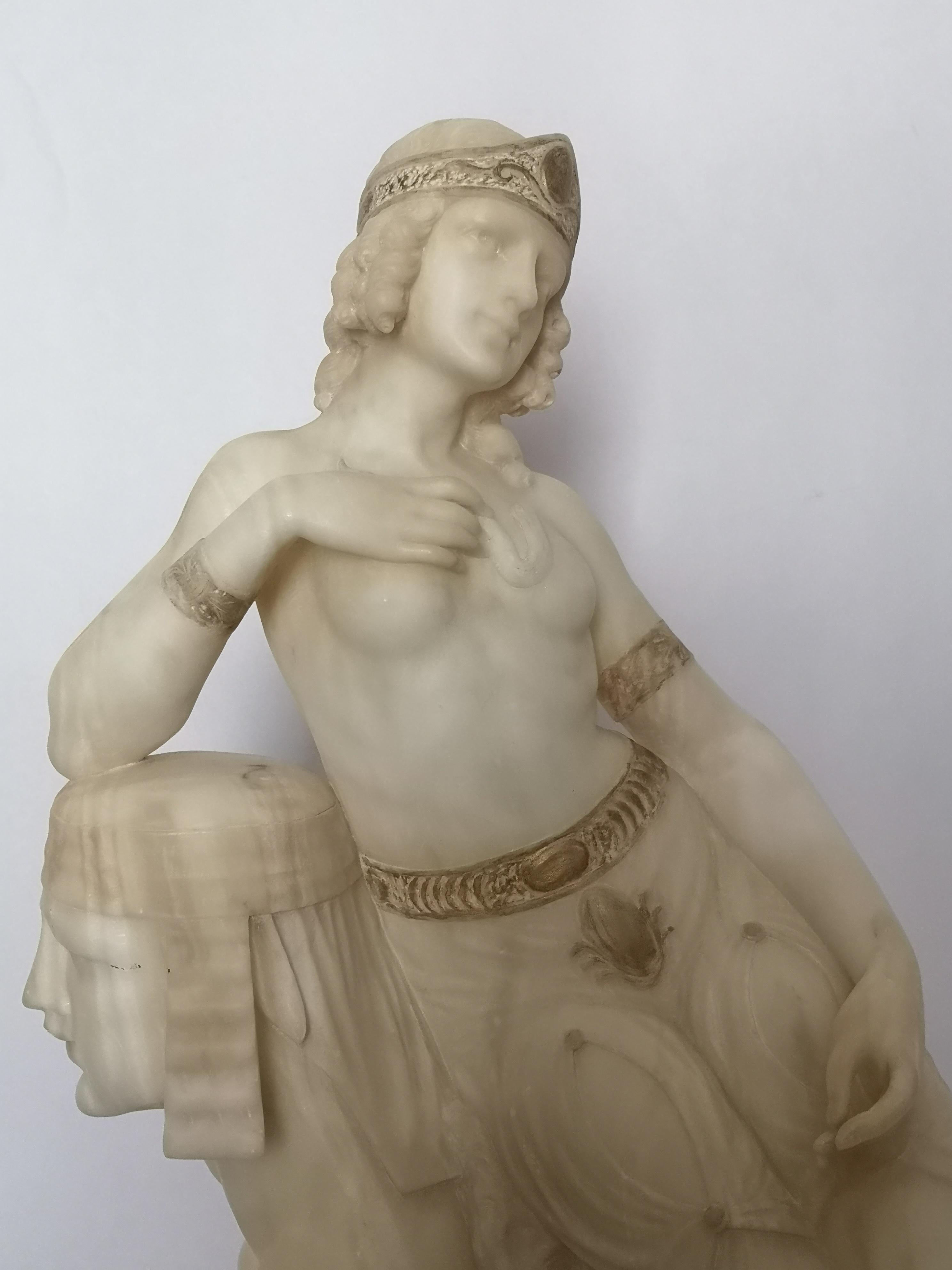 A very stylish Italian Art Deco sculpture, of Egyptian influence. The seated lady with gilt highlighted headpiece and waistband, with a lion skin rug draped over the sphinx. Signed to the back 'F Masini Florence'.
Italian, circa 1920.