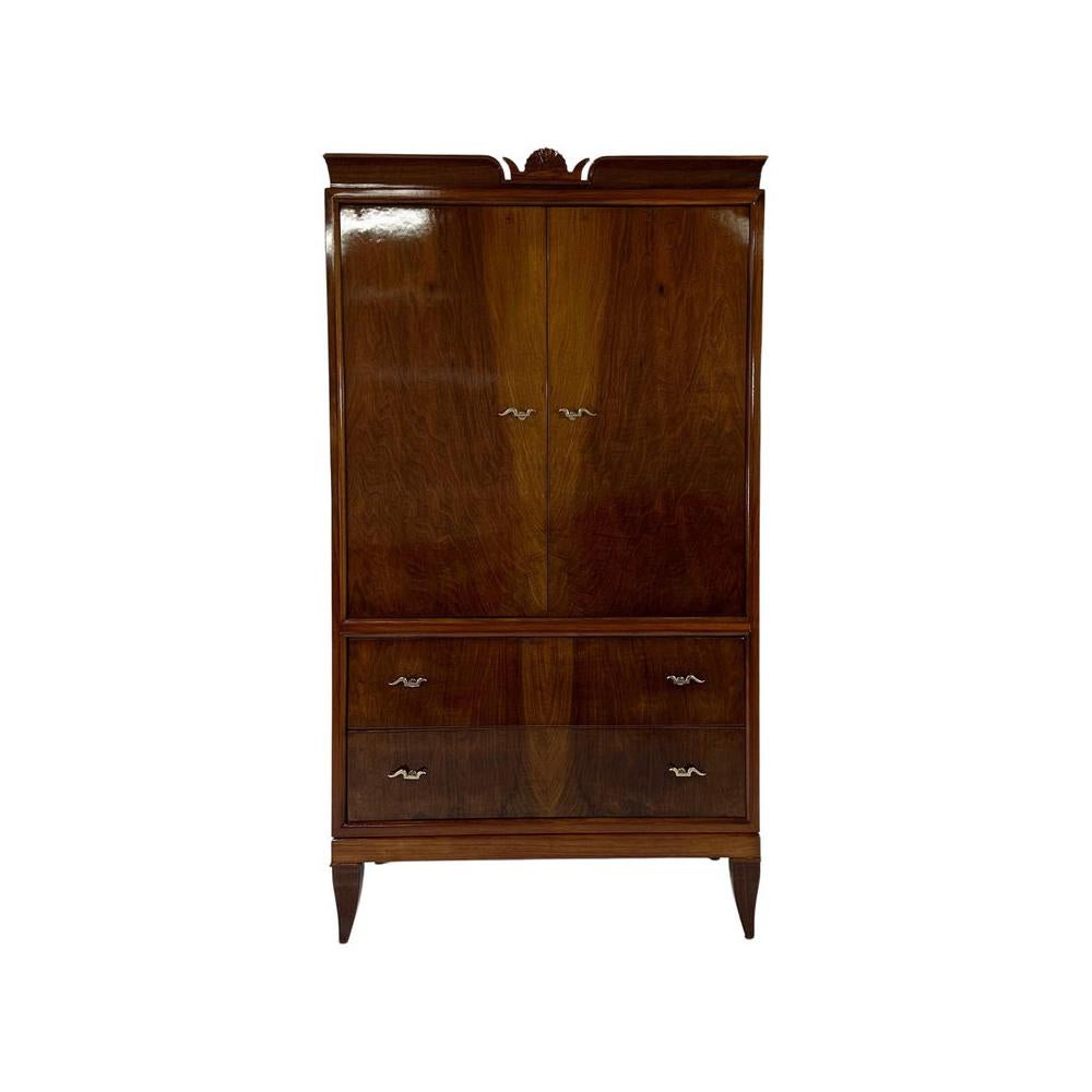 This set was produced in Italy, in Cantù (small village in the north of Italy, next to Milan), by Paolo Lietti & Figli and designed by Gio Ponti. It features a mirror manufactured by Luigi Brusotti a matching dresser and an armoire.
It was produced