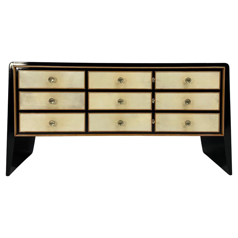 This Italian set of Dresser and Nightstands was produced in the 1940s in Italy, the structure is black lacquered while the front are in parchment with the profiles in maple. The handles are made of brass. 

Measurements of dresser: 167cm x 52cm