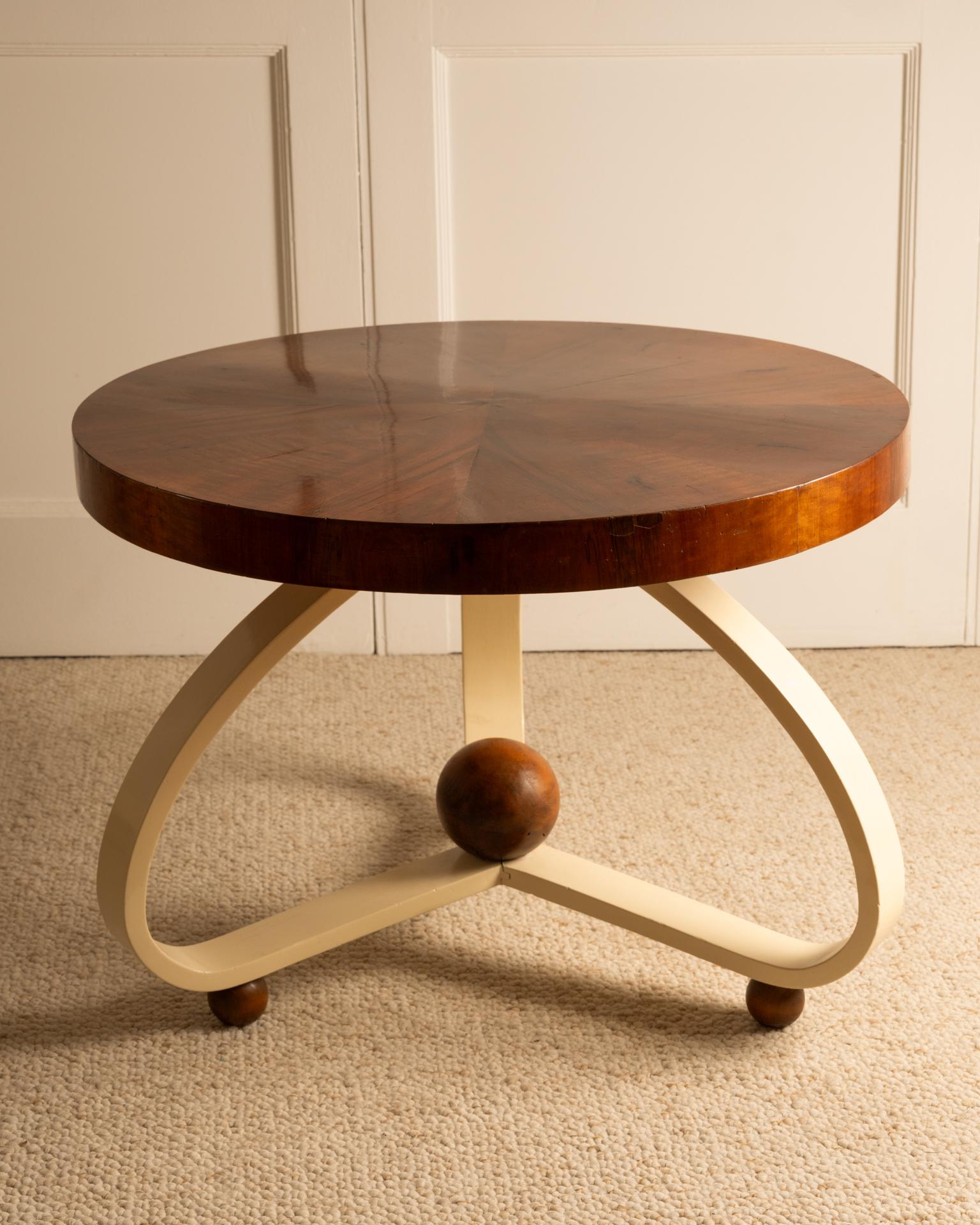 Coffee table, Italy 1930s.

Walnut wood, walnut root veneer, lacquered wood.
Useful wear consistent with age.