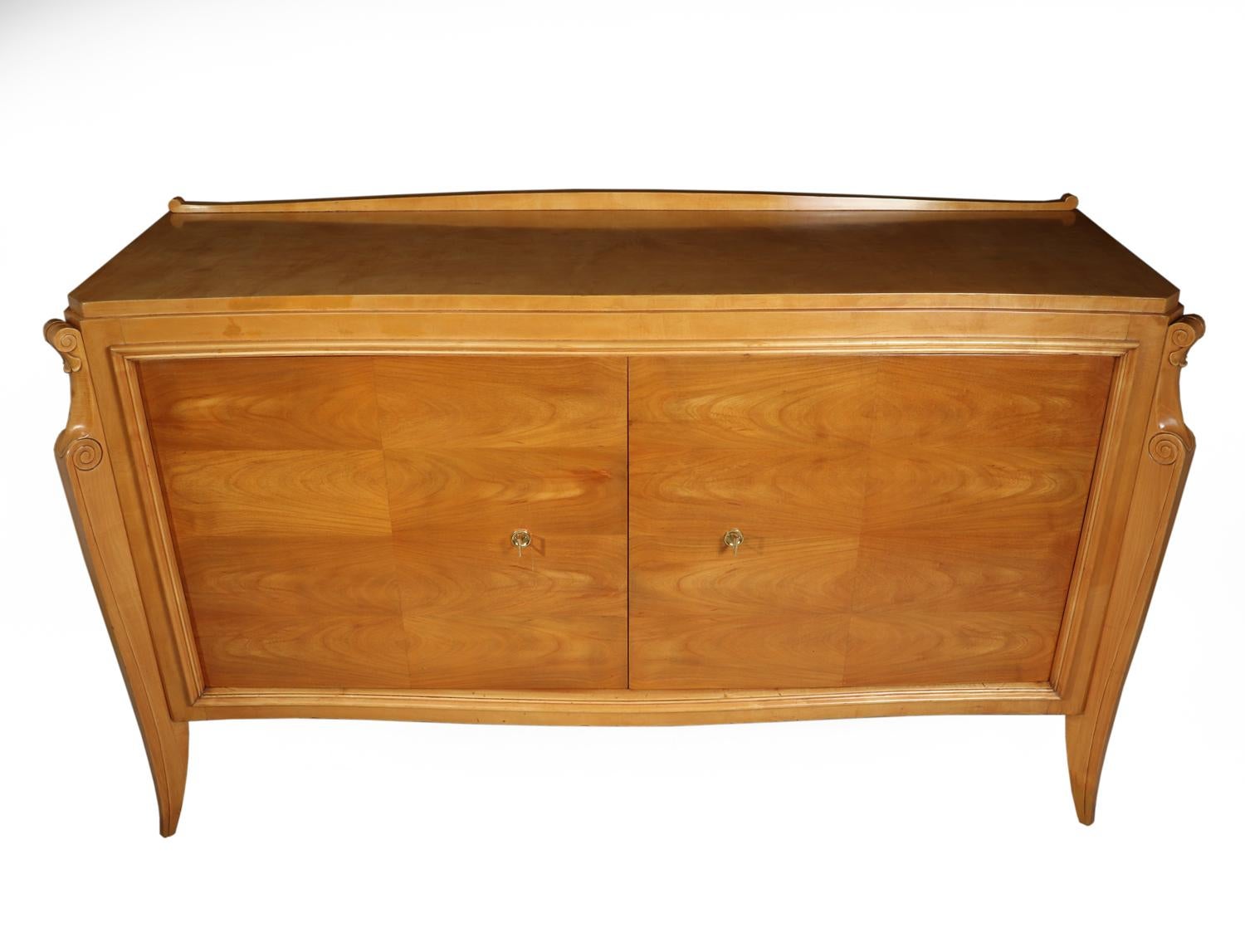 Italian Art Deco sideboard , circa 1930
This Original Italian, Satin Birch, Art Deco sideboard from the 1930s. It has two lockable door with one key. Inside the sideboard are two shelves that can be adjusted to give different heights and has been