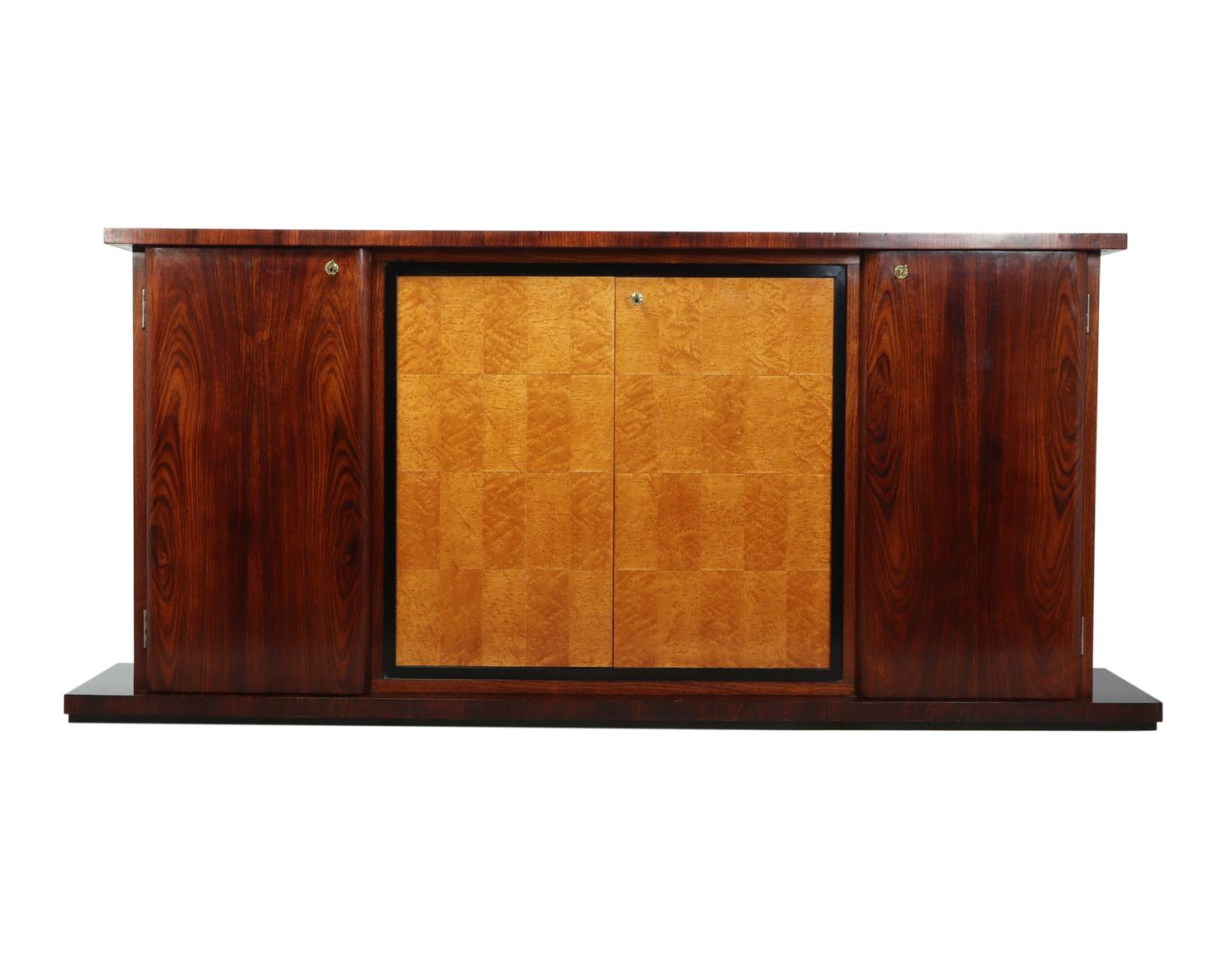 Italian Art Deco sideboard in rosewood and bird's-eye maple
A very large and slim Art Deco sideboard produced in Italy in the 1930s with four doors, these have a single shelf behind every lock has a key and all in working order, the sideboard has