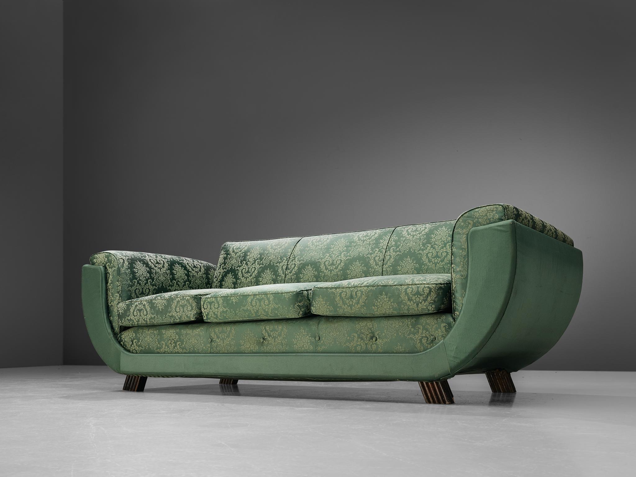 Three seat sofa, floral patterned green upholstery, Italy, 1940s

Italian three-seat sofa with shiny green floral patterned upholstery. The true eyecatcher of this sofa is the gondola-shaped frame which floats upwards into the armrests. The rounded