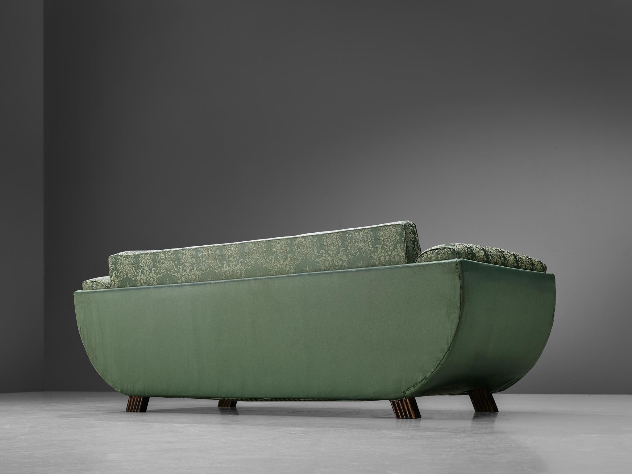 green patterned sofa