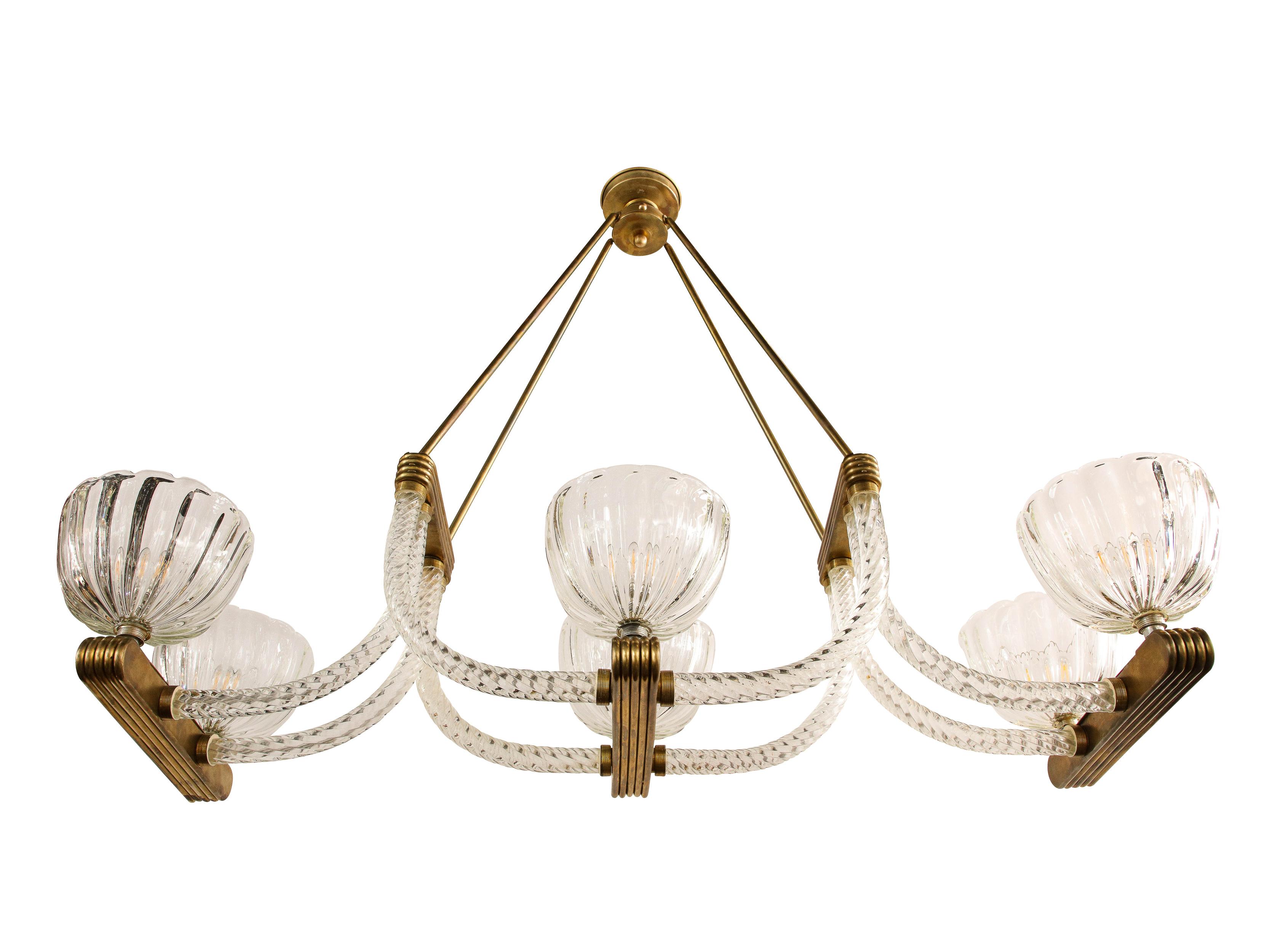This magnificent Art Deco chandelier was realized by the legendary workshop of Ercole Barovier in Murano- the island off the coast of Venice renowned for centuries for its superlative craftsmanship- circa 1940. It features six billowing sculptural