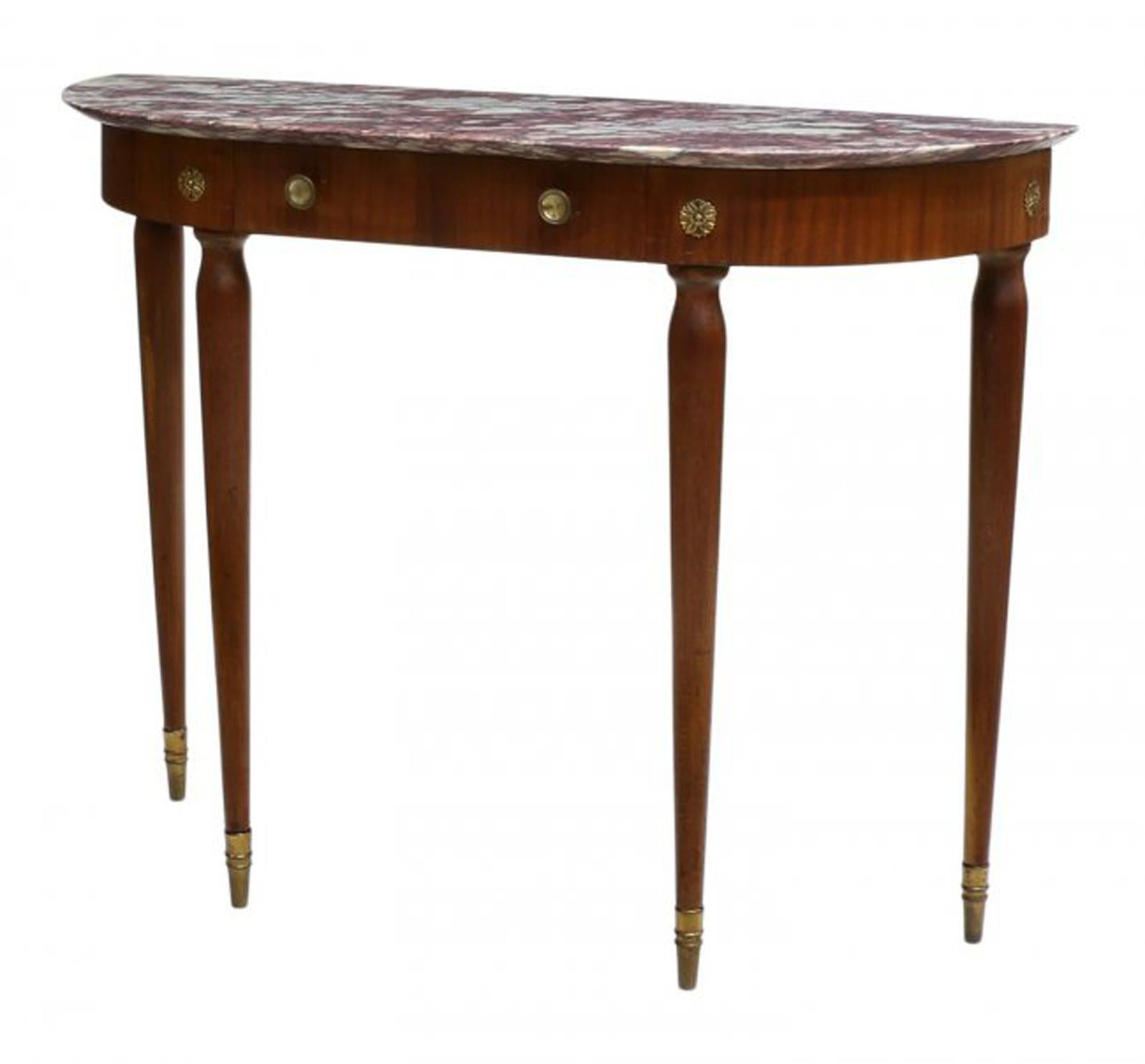 Italian Art Deco style marble topped console with a single drawer,
mid-20th century.
The beautiful marble top is over a veneered frieze with one short drawer, resting on four round tapered legs.