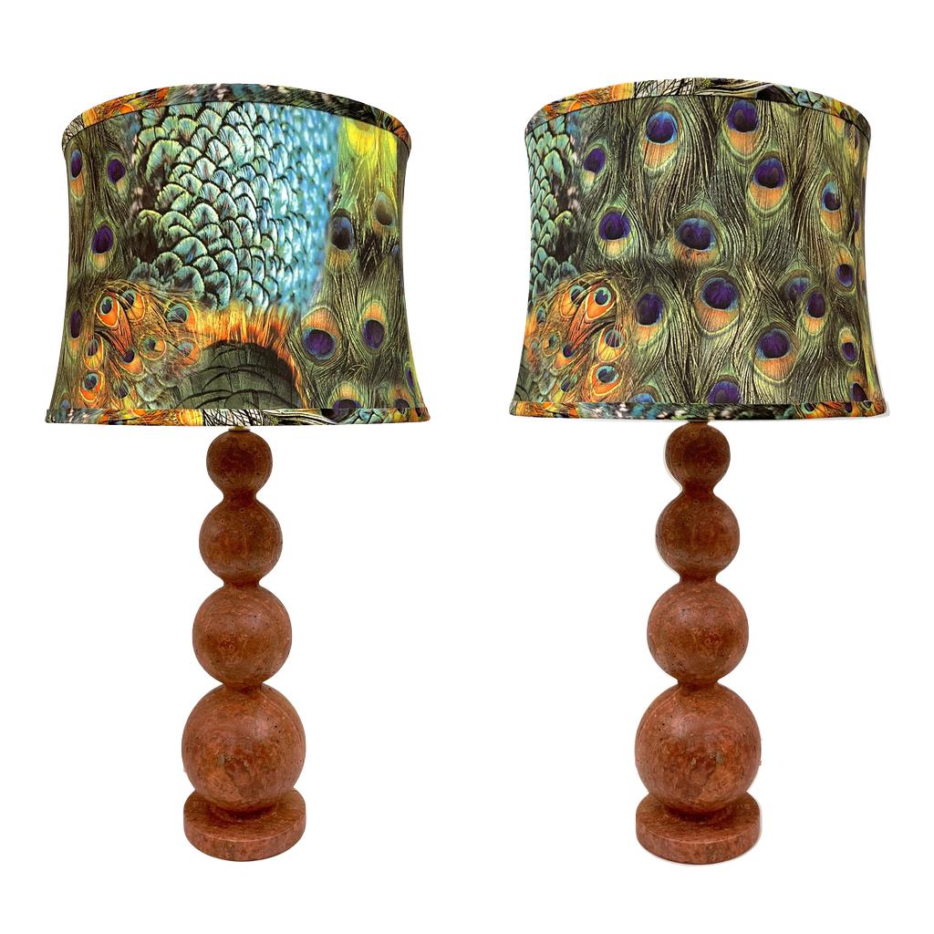 Contemporary Italian work, entirely handcrafted, in a variegated red Travertine stone, presenting earth colors: burnt orange terracotta, red-brown, with few yellow streaks, bringing an organic and expressive feeling. The curved design with round