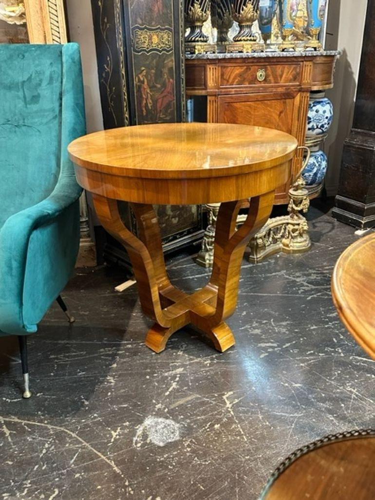 Handsome Italian Art Deco style walnut side tables. Beautiful wood finish. Creates a very polished look. Gorgeous! Note: Price listed is for 1. We have 2 available.