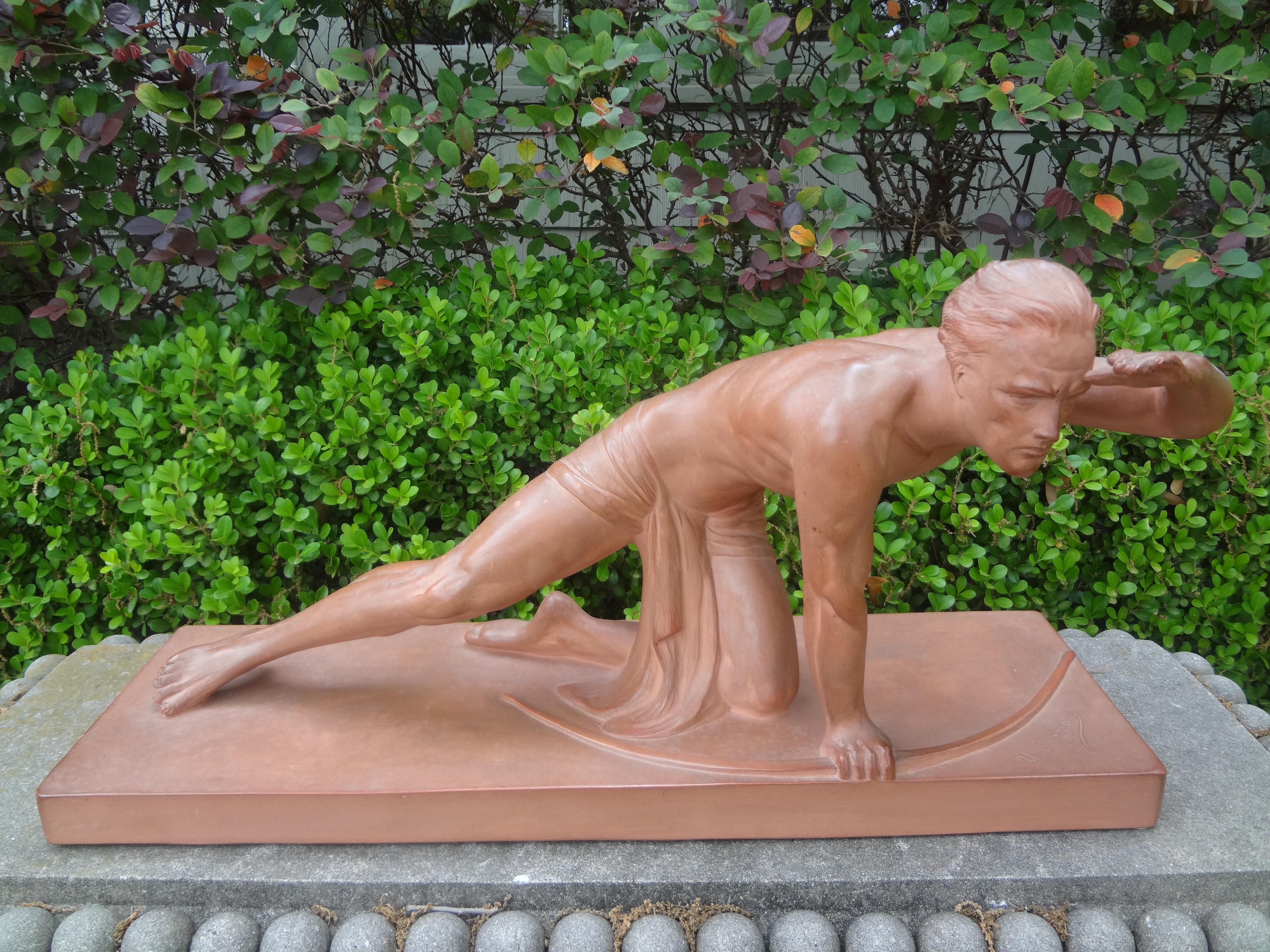 Italian Art Deco terracotta sculpture signed U. Cipriani.
Italian Art Deco terracotta sculpture of a male athlete artist signed, Ugo Cipriani.
This terra cotta sculpture is finely detailed and in very good antique condition.