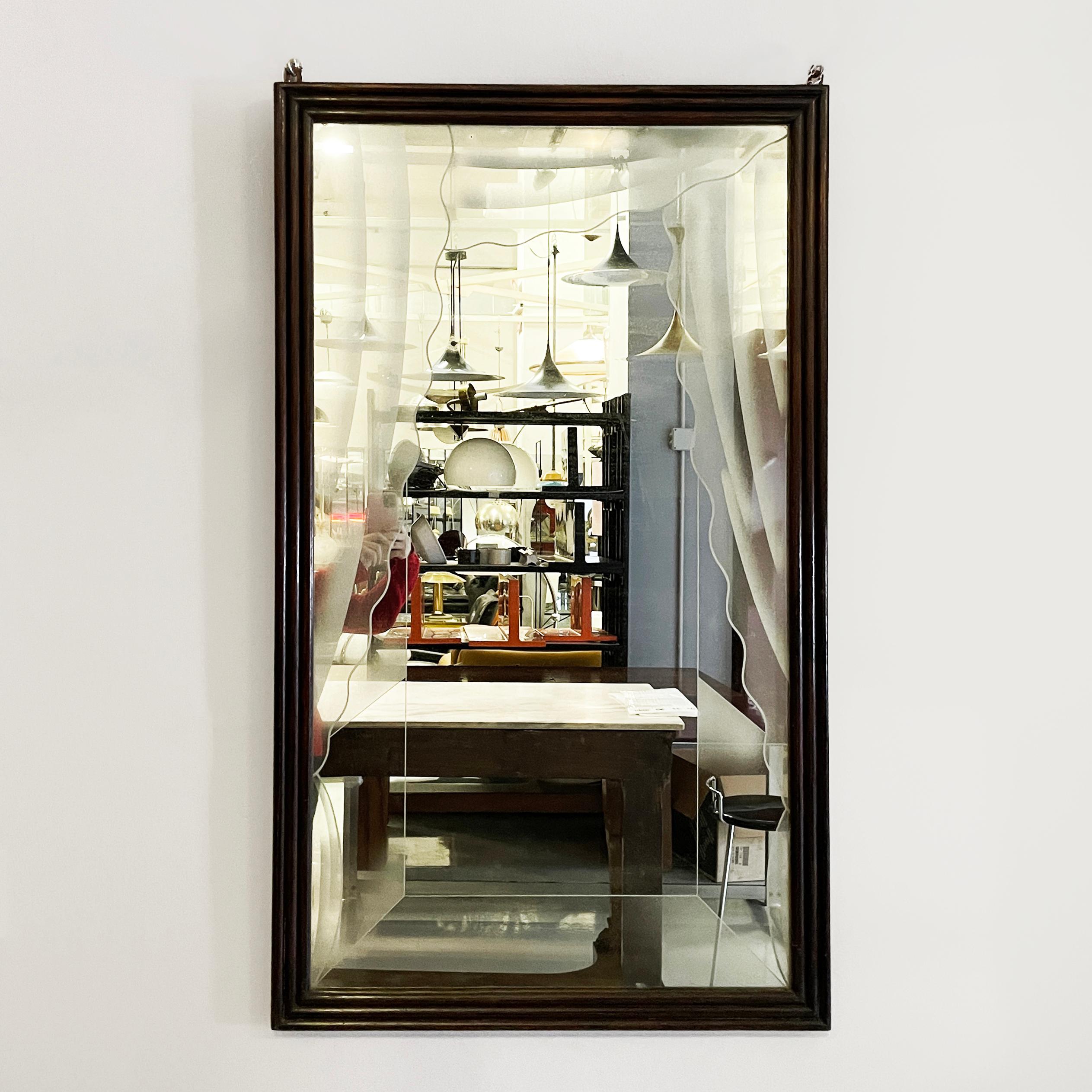 Italian art deco Wall mirror with acidified decorations in grissinato wood 1930s
vintage and fantastic wall mirror with dark grissinato wooden frame. The rectangular mirror features acidified decorations that resemble a curtain. In the upper part it