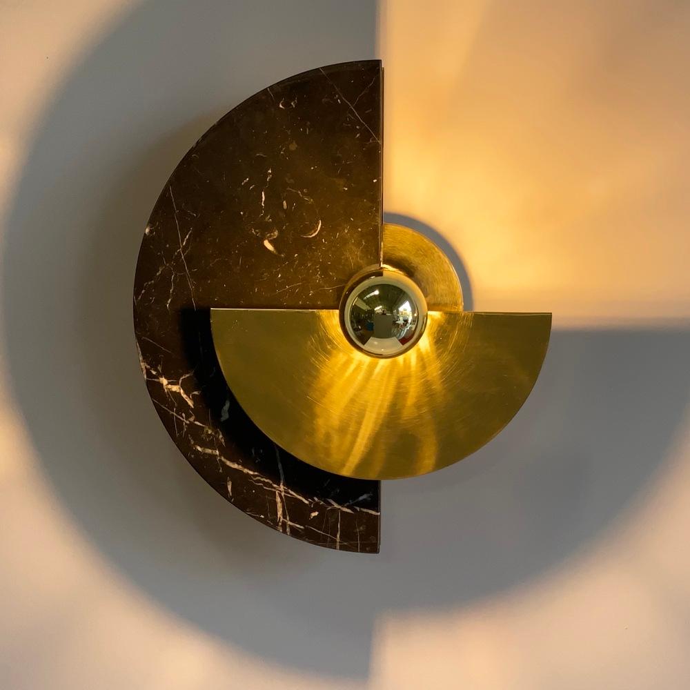The Levante wall sconce with its circular shape is a strong reference to the sun. This design element gives the sconce an artistic and symbolic quality that can add interest and meaning to the decor of a room. The circular shape is often associated