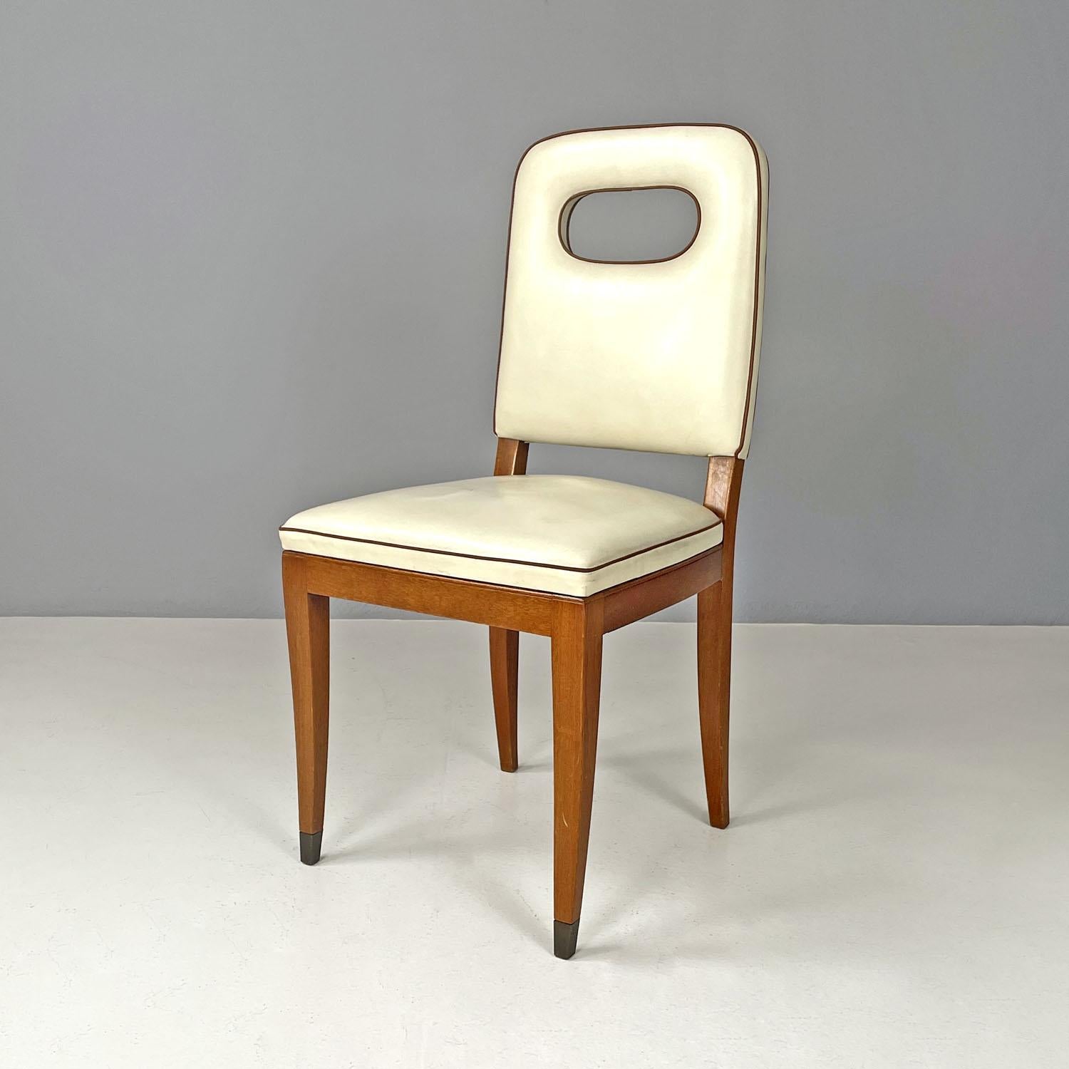 Italian Art Deco white leather and wood chair by Giovanni Gariboldi, 1940s
Chair with rectangular seat with wooden structure. The seat and back are padded and covered in white leather with brown leather profiles, fixed to the structure using white