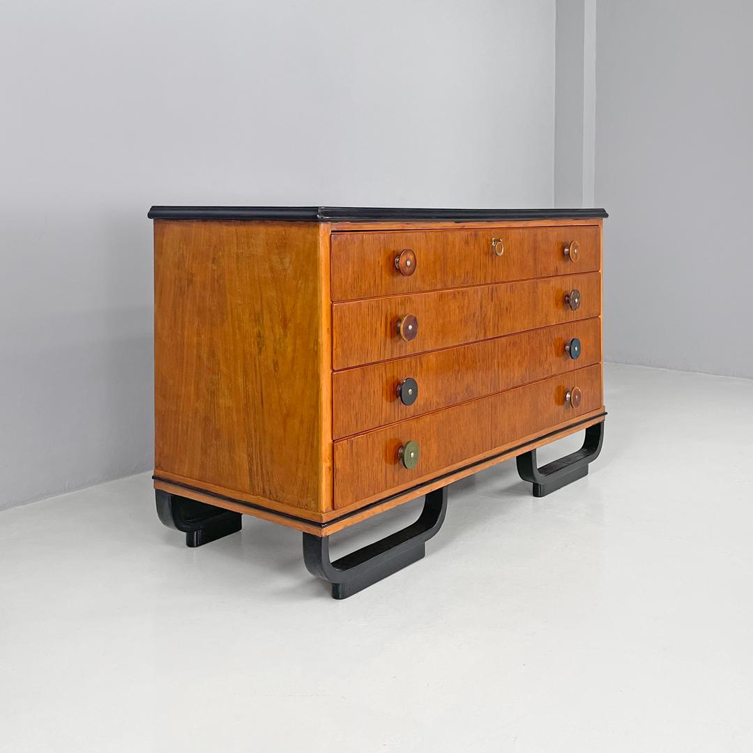Mid-20th Century Italian Art Deco wooden chest of drawers with black top and arched feet, 1930s For Sale