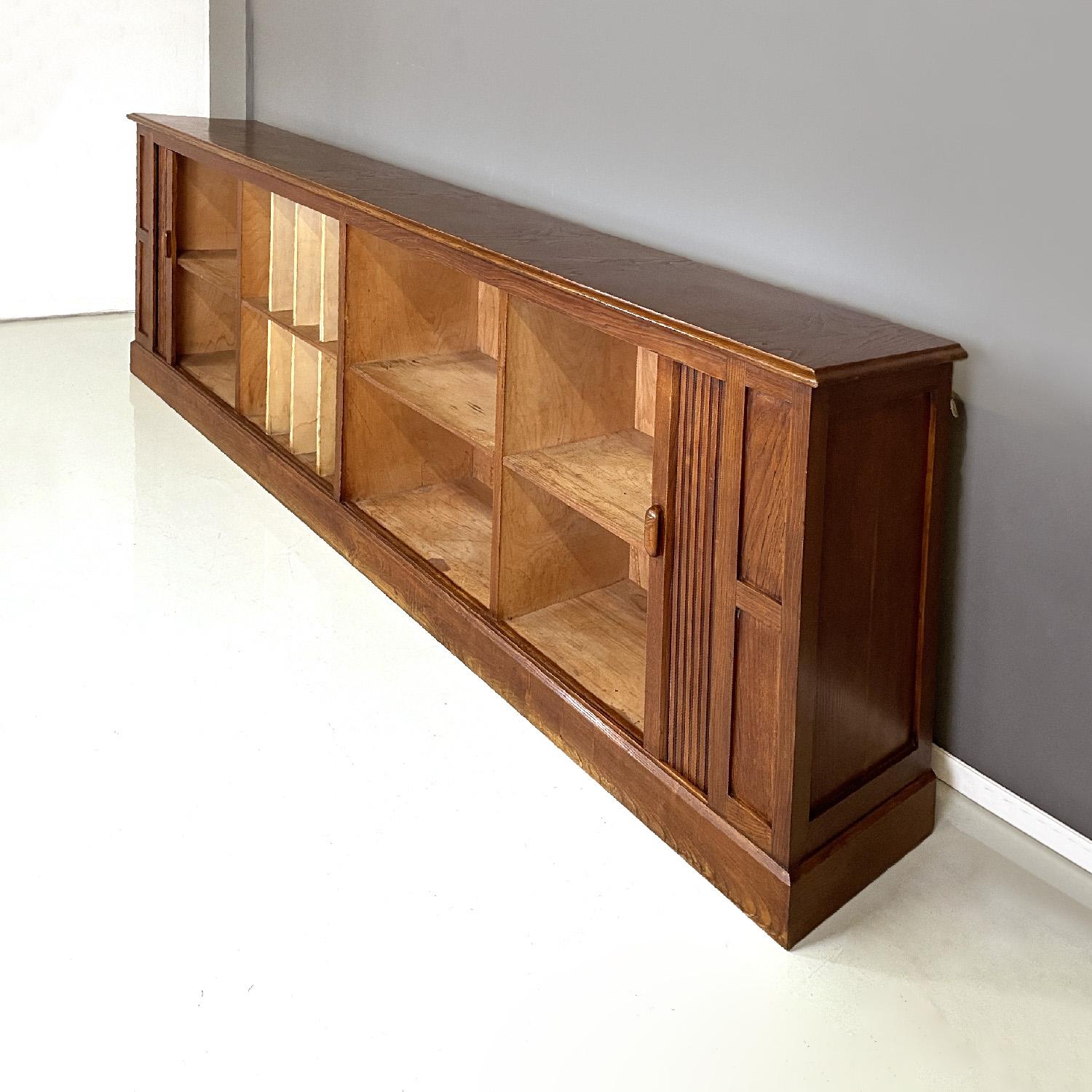 Legno Italian Art Deco wooden sideboard with shutter opening, 1920s in vendita