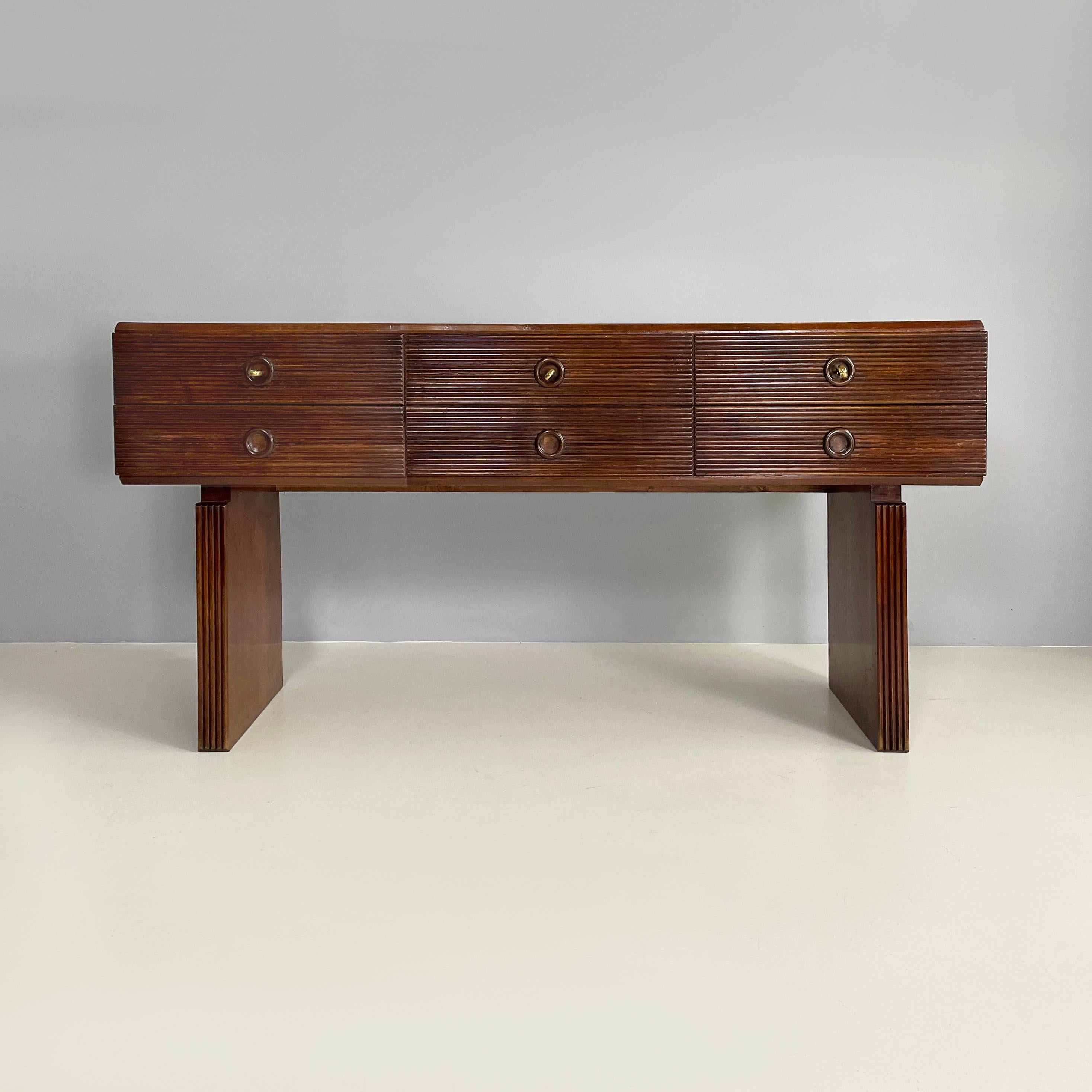 Italian Art Deco wooden sideboard with six drawers by Gio Ponti, 1940s 
Sideboard with rectangular wooden top. It has six striped wood drawers with each a hole with a turned wooden frame that acts as a handle. The three upper drawers have working