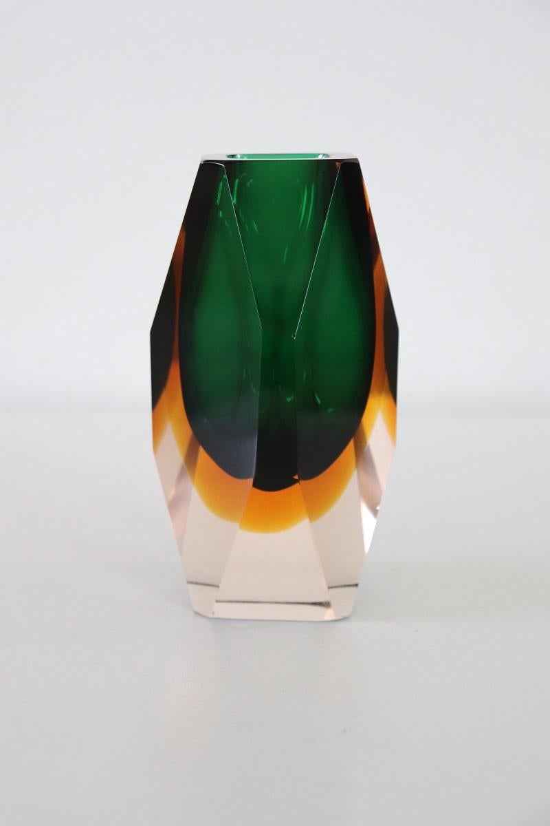Italian desgn 1960s murano art glass green, yellow and transparent small vase. Beautiful Murano glass vase, designed by Flavio Poli for Alessandro Mandruzzato (Murano, Italy, 1960s). This small vase is made of thick glass. Beautifully faceted glass.