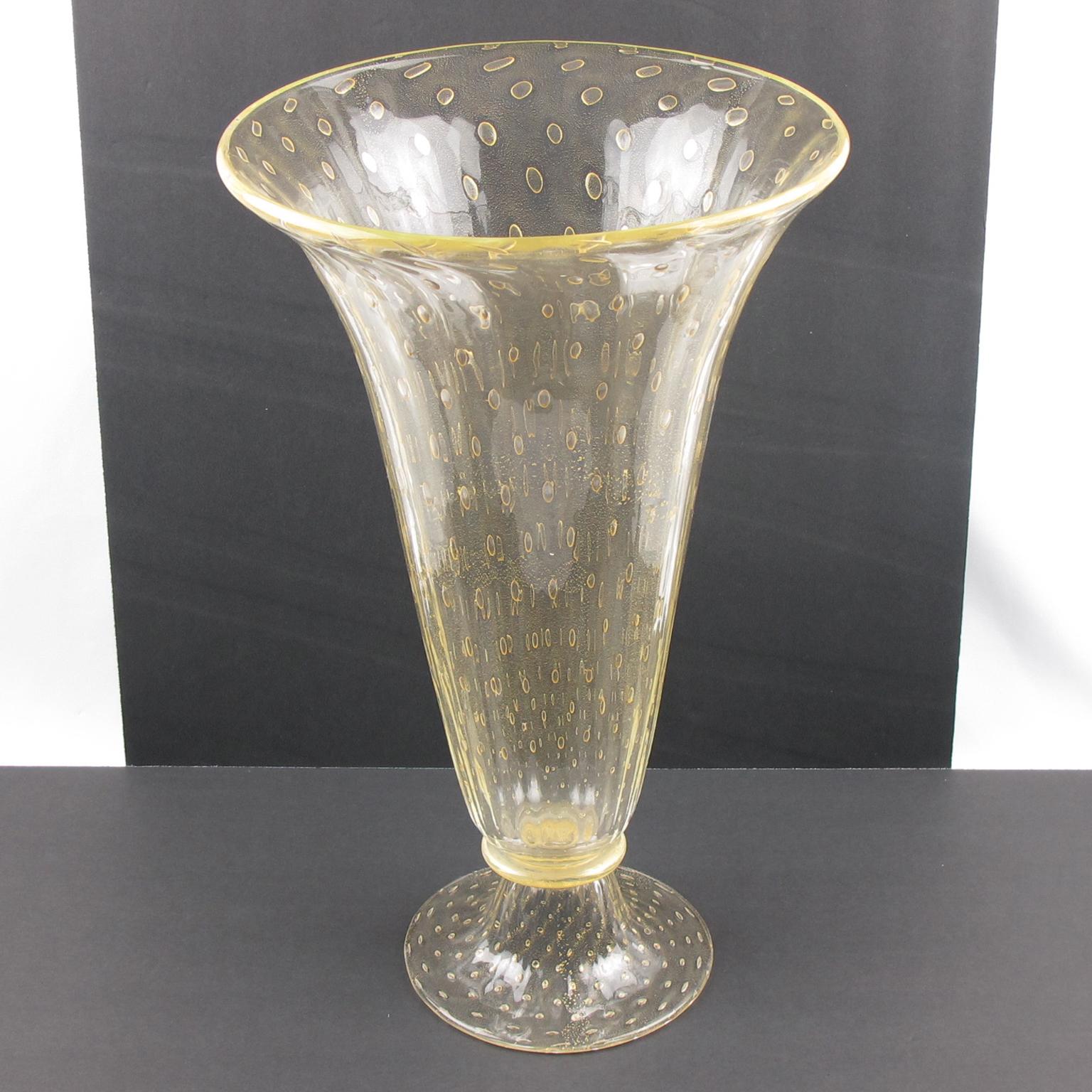 Beautiful hand blown Italian Art glass vase by Serenella Arte, Murano. Extra tall sculptural tulip shape with infused gold flakes inclusions and 'bollicine' technique (inclusions of tiny air bubbles). Avventurina is a specific process developed by