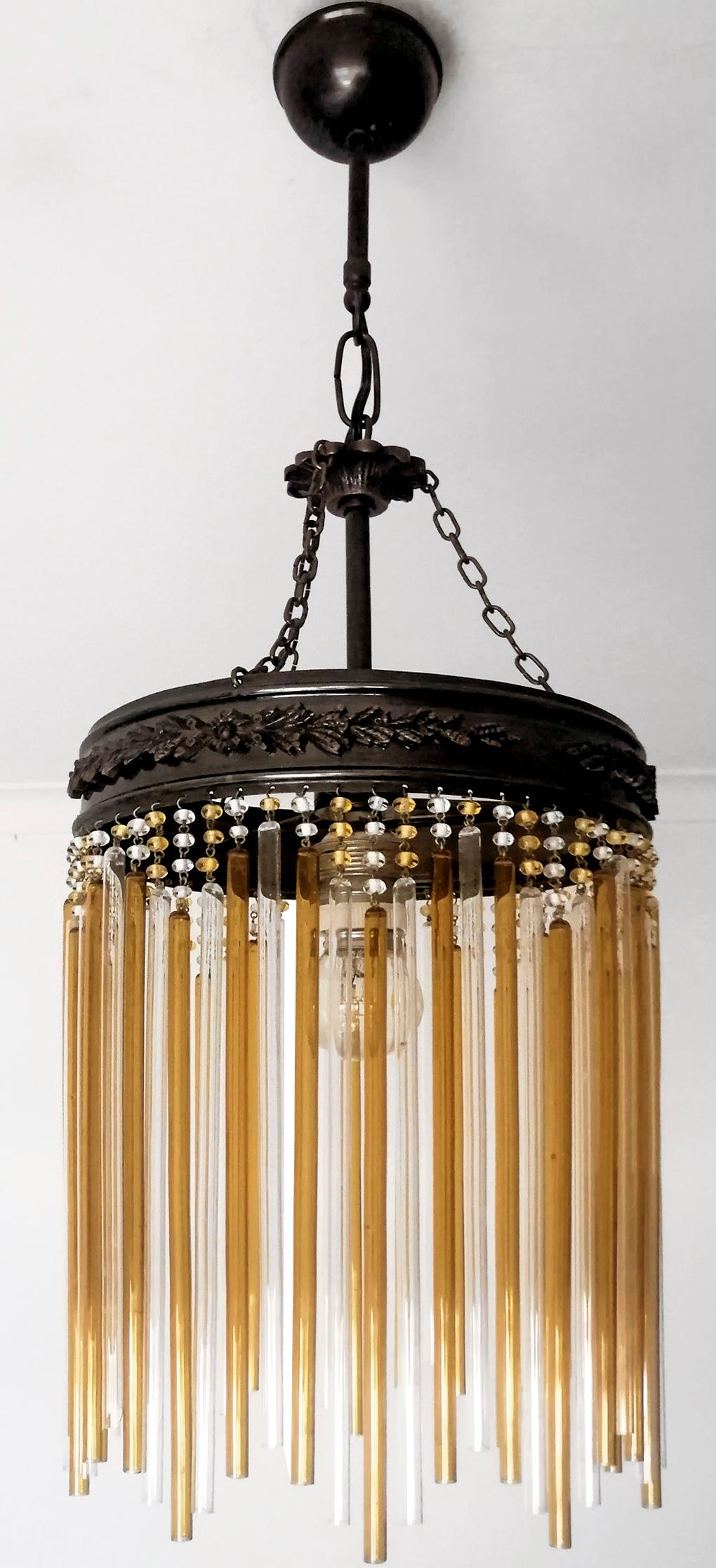 Beautiful antique Italian Art Nouveau and Art Deco Murano amber crystals chandelier in a radial pattern with a very sparkling effect typical of Hollywood style and glamour. 

Measures:
Diameter 7.88 in /20 cm
Height 23.63 in / 60 cm
1-light