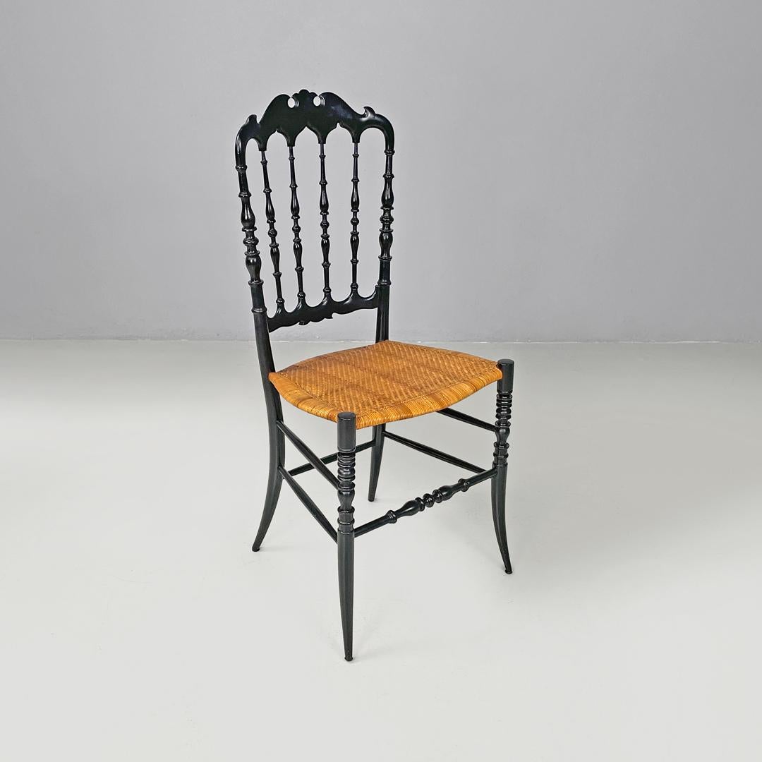 Italian Art Nouveau Chiavarina chairs in black wood and wicker, early 1900s
Set of ten Chiavarina chairs in black painted wood. The structure is decorated with rounded curved lines, with the slats of the backrest, the footrests and the turned legs.