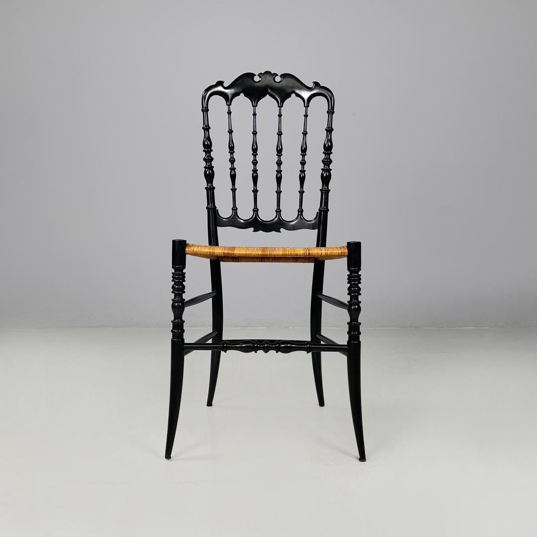 Italian Art Nouveau Chiavarina chairs in black wood and wicker, early 1900s In Good Condition For Sale In MIlano, IT