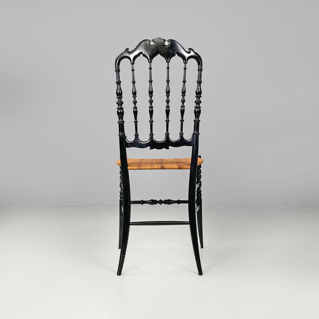 Italian Art Nouveau Chiavarina chairs in black wood and wicker, early 1900s For Sale 1