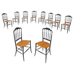 Antique Italian Art Nouveau Chiavarina chairs in black wood and wicker, early 1900s