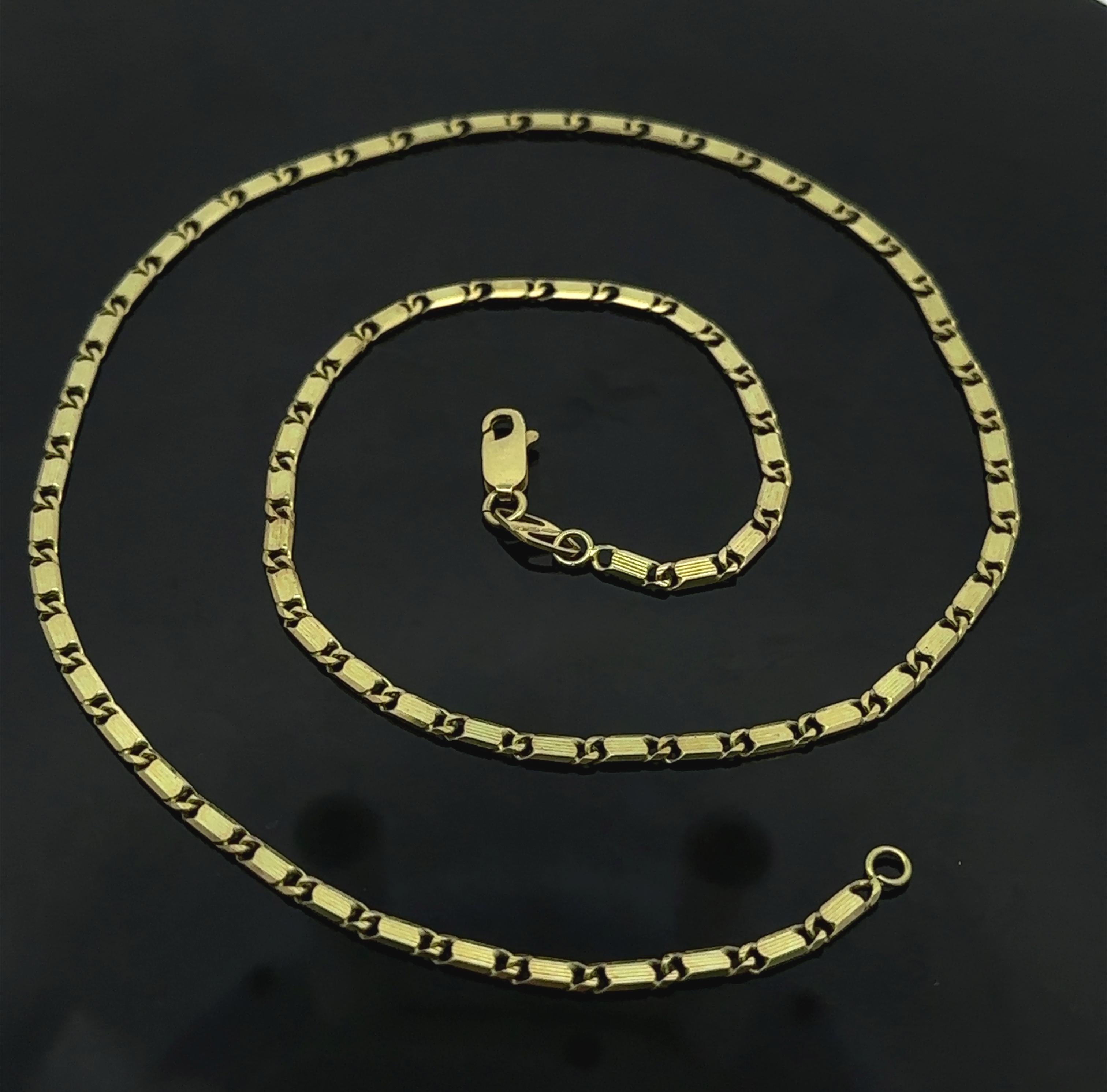 MATERIAL : Or jaune 18k massif 
Poids : 15,52 grammes
Type de chaîne : 19.5