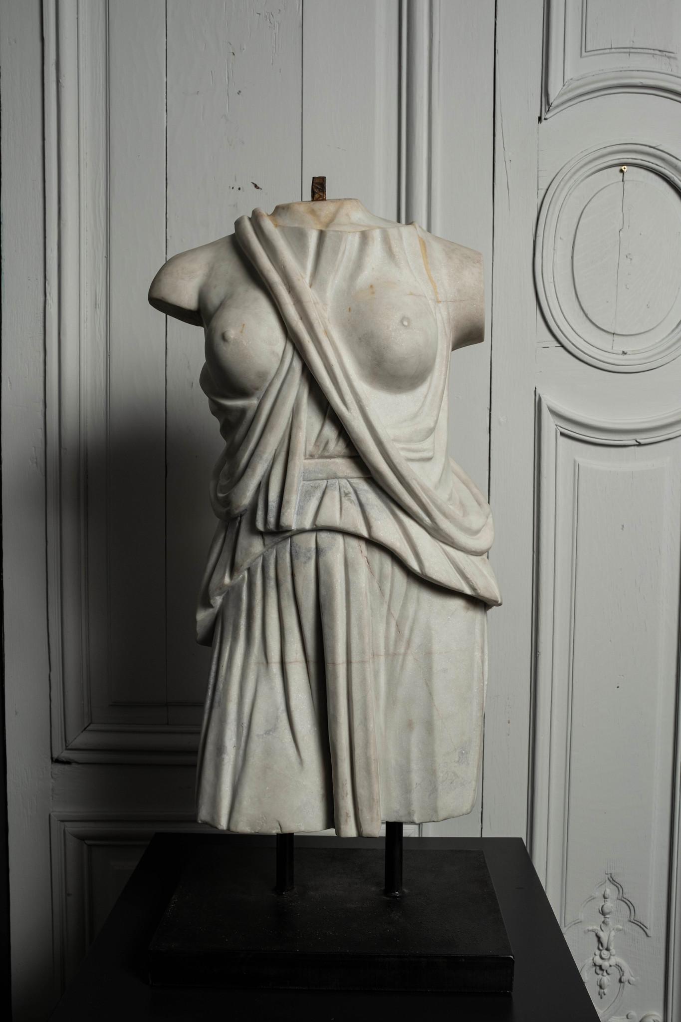 Early 20th Century Italian Artemis white statuary marble torso on bronze base.