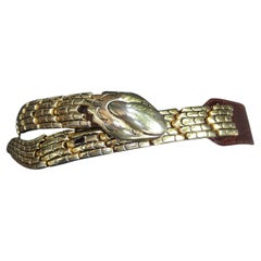 Cintura italiana articolata in metallo dorato in rilievo in pelle marrone con design a serpente, anni '80 circa
