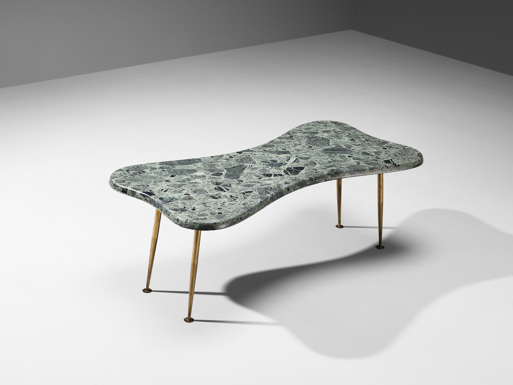 Coffee table, marble, brass, bronze Italy, 1950s

Hailing from a skilled artisan of Italy, this exceptional coffee table reflects the design principles of the Mid-Century era that rose to prominence in the 1950s. The design serves as a testament