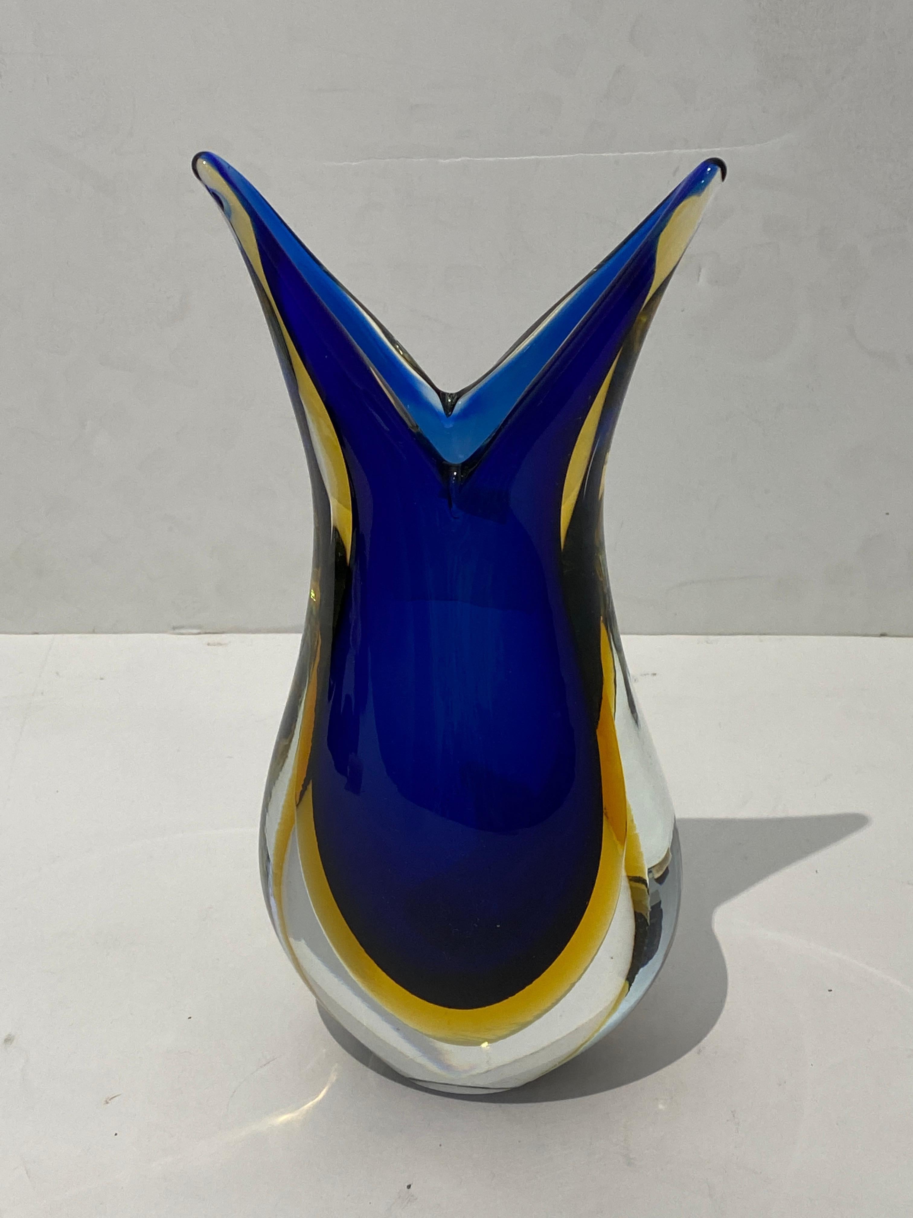 This stylish Italian artisan glass vase will make a subtle statment with its form and coloration, and the sommerso technique is quintessentialy Italian.