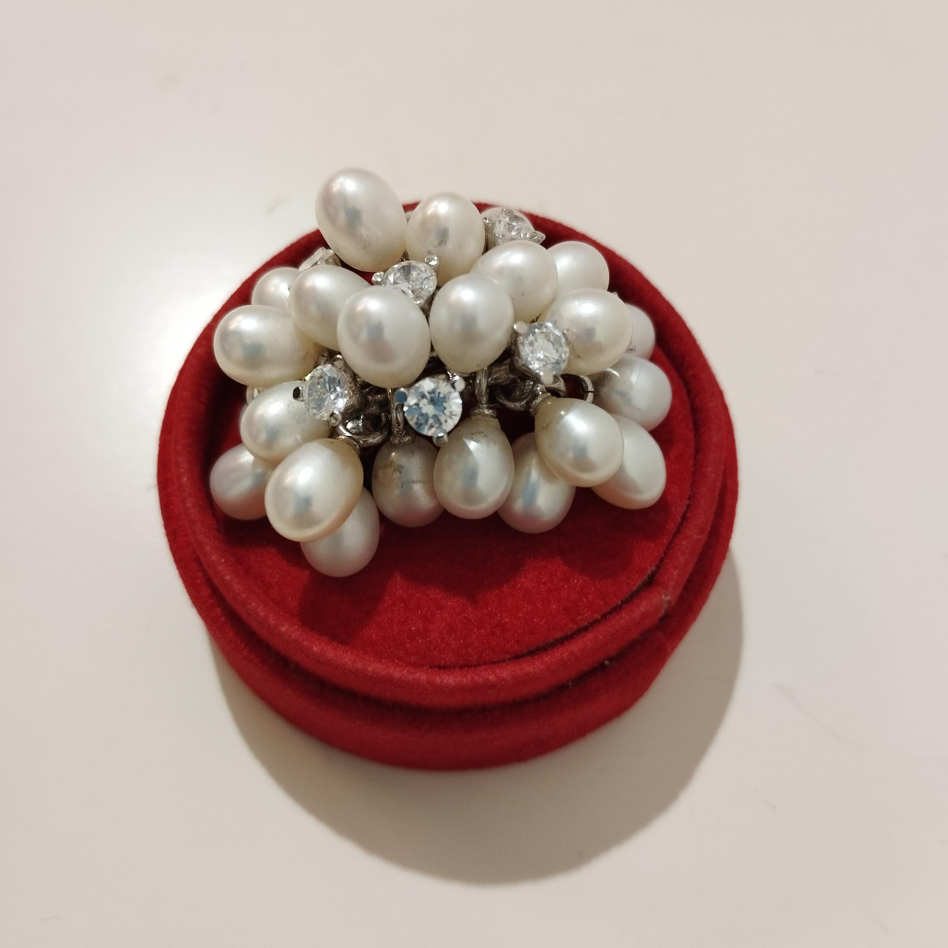 Fantastic ring, italian manufacture
White Gold
Pearls 
9 Zircons
Comes with beautiful red velvet and painted ring case
Size 10 Italian, FR 50, UK K, US 5
