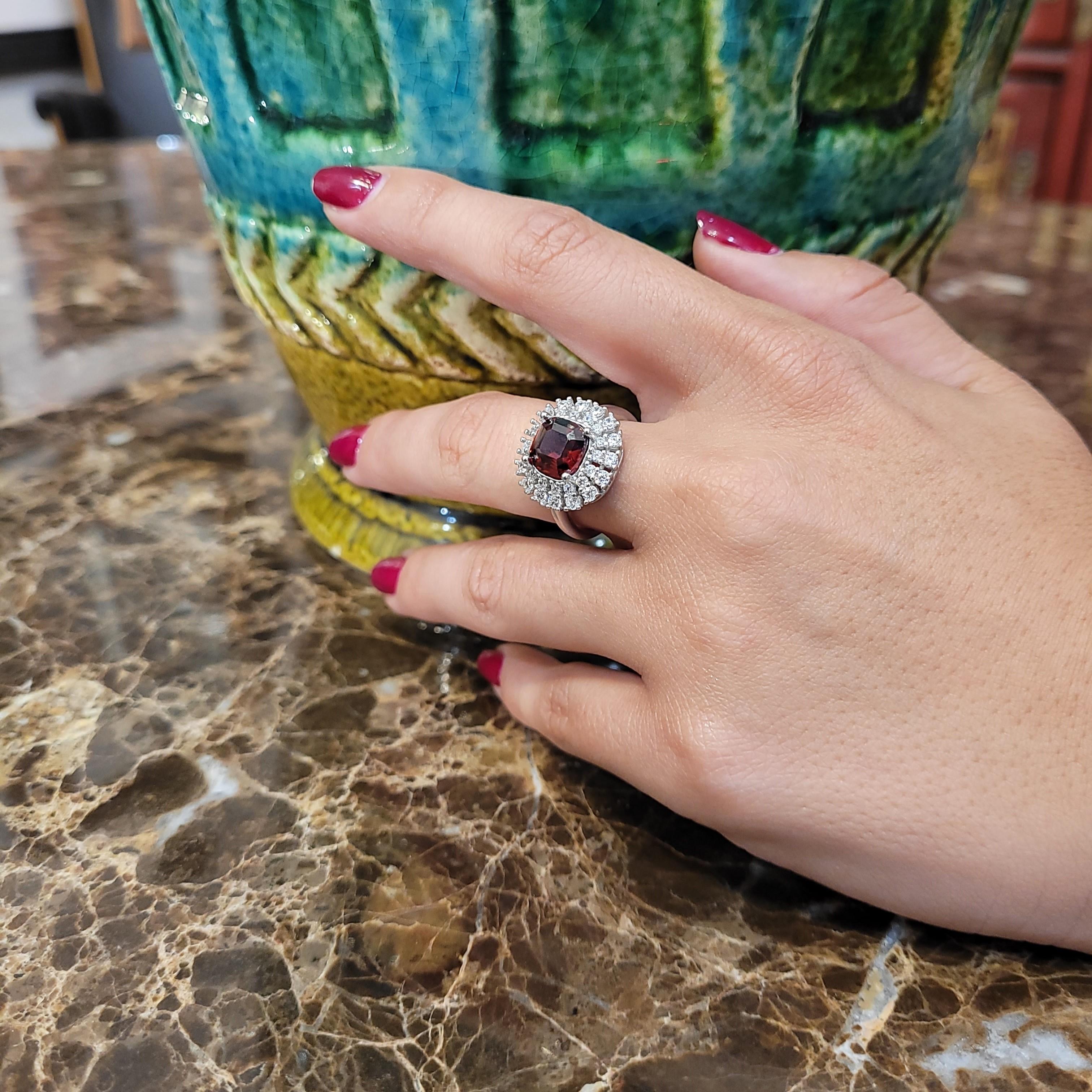 Exquisite and very refined  ruby ​​engagement ring for women, high Italian jewelry, Natural dove, red blood, ruby ​​as a central stone in Asscher cut, great clarity and brilliance without garden. It is framed by a beautiful double crown of