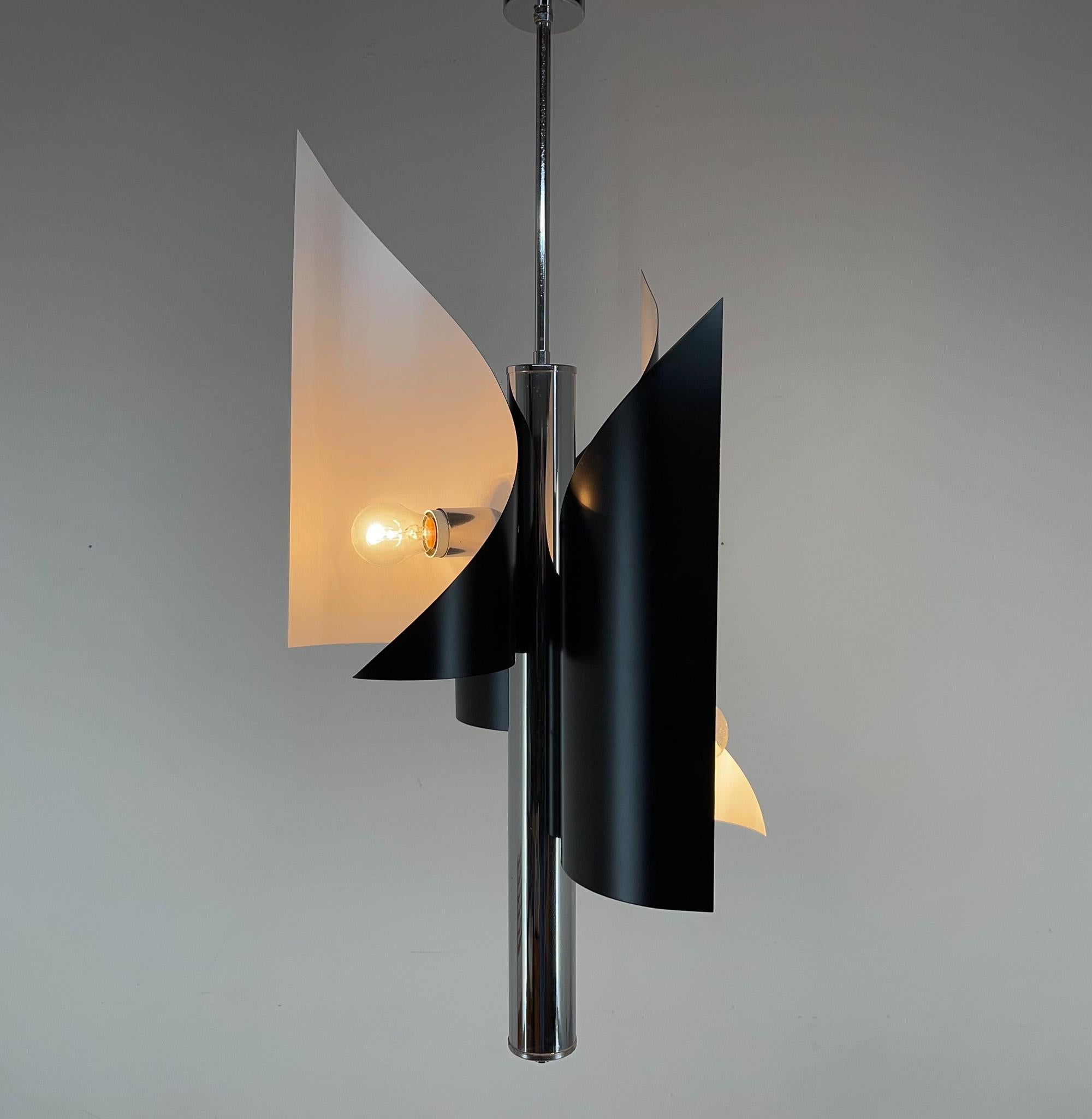 Beatiful vintage asymetrical chandelier / pendant from Italy. Produced in the 1970's. Made of chrome and laquered metal in blue colour. Newly sprayed in black and white colour. Bulbs: 3 x E25-E27.