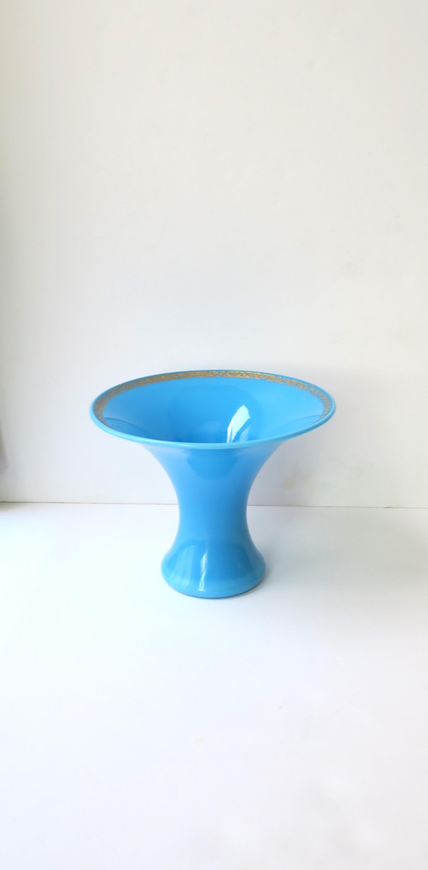 A beautiful Italian azure blue opaline glass vase with gold detail around lip, circa mid-20th century, 1960s, Italy. Beautiful as a standalone piece or with flowers. Vase has a nice top diameter to support bouquet, and a gold detail around edge.